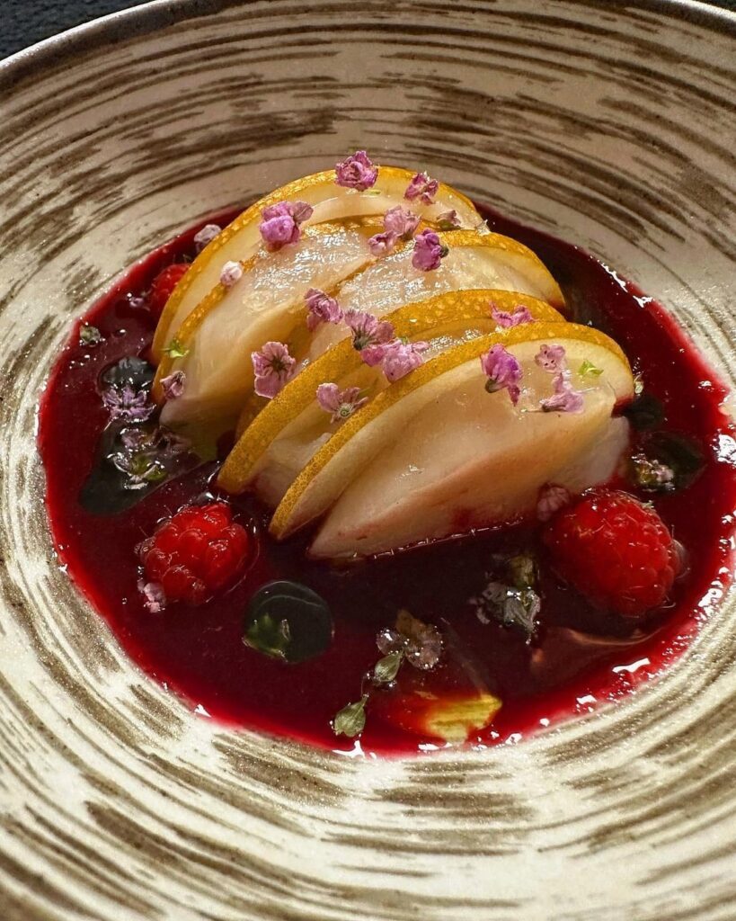 Raw diver scallop, Asian pear, raspberries, and red beet aguachile.