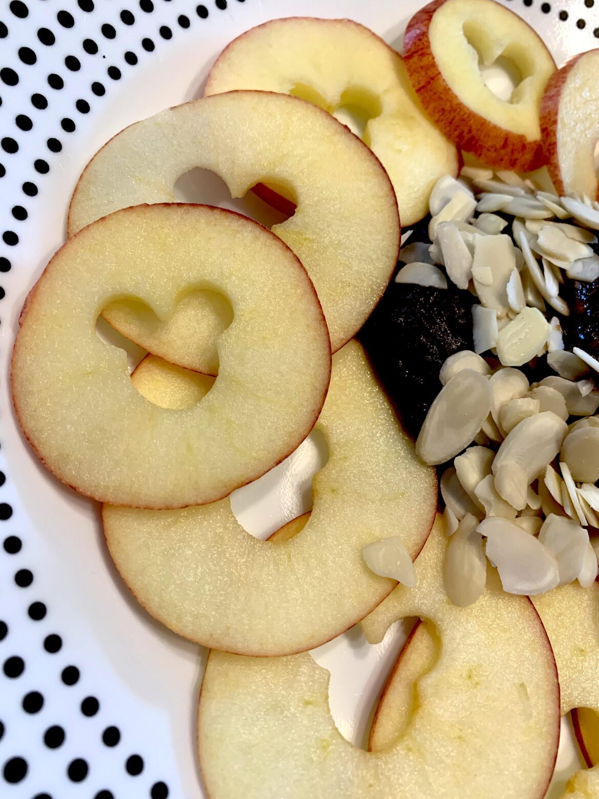 Apple nachos with date caramel sauce and almonds
