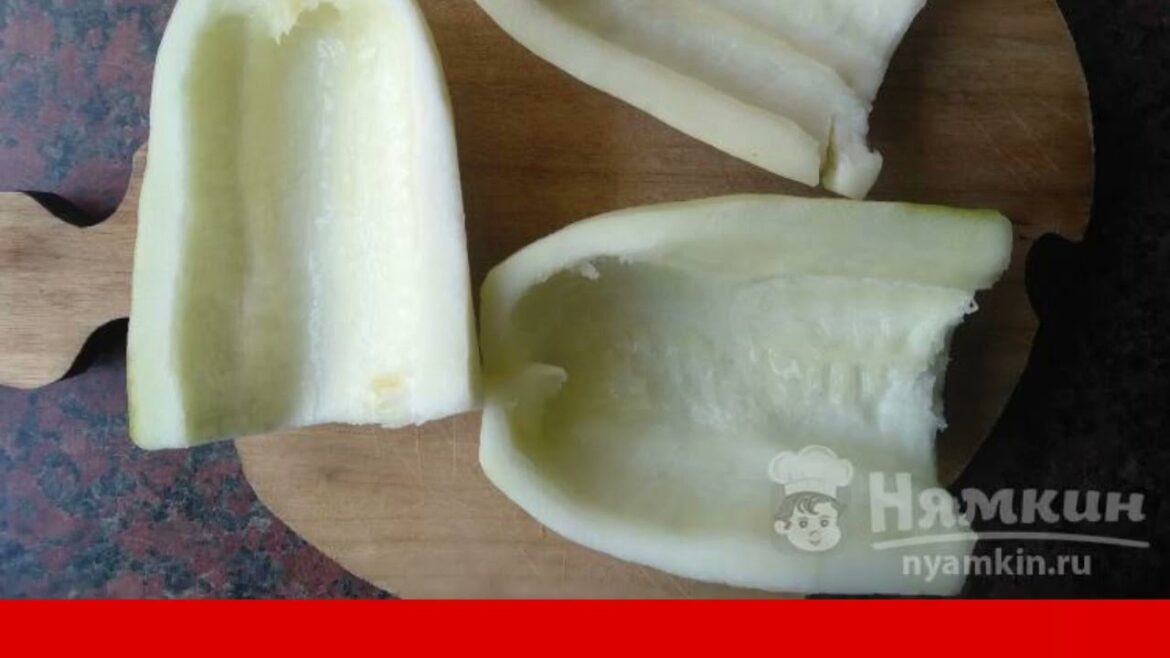 Baked zucchini stuffed with cottage cheese and garlic in the oven