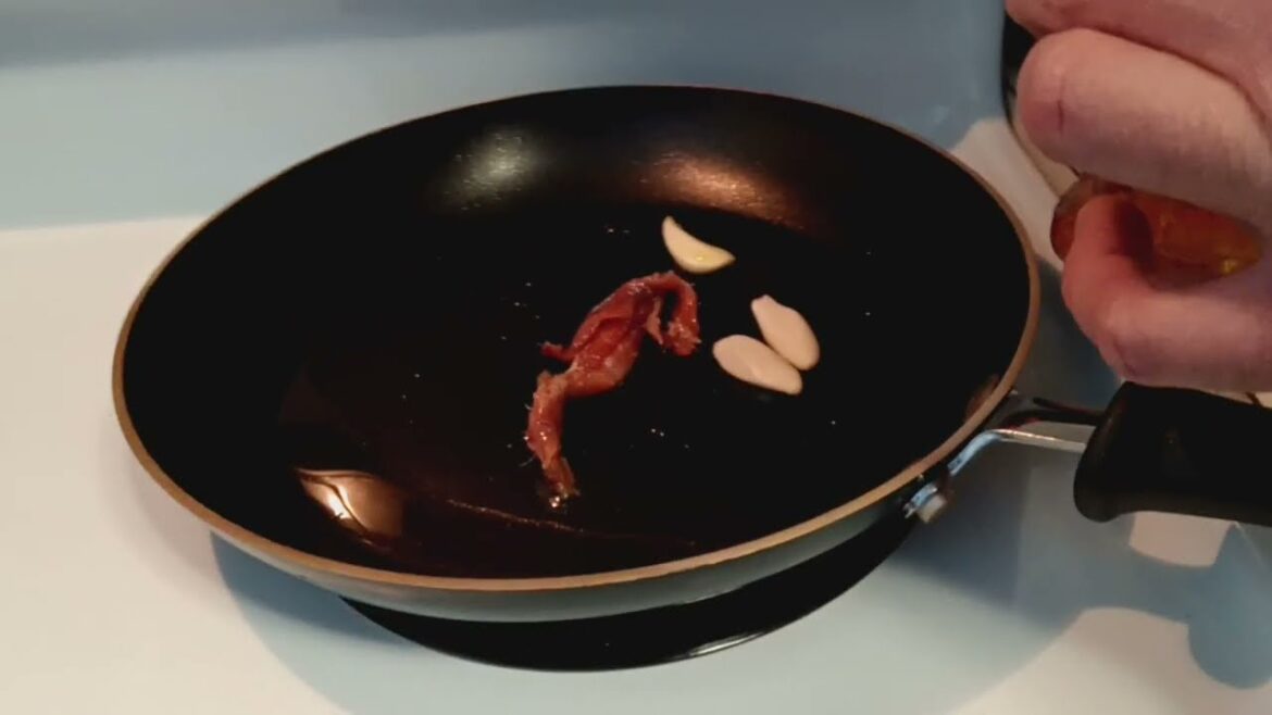 Italian spaghetti with anchovies and bread crumbs, the taste of the Mediterranean Sea in your table.