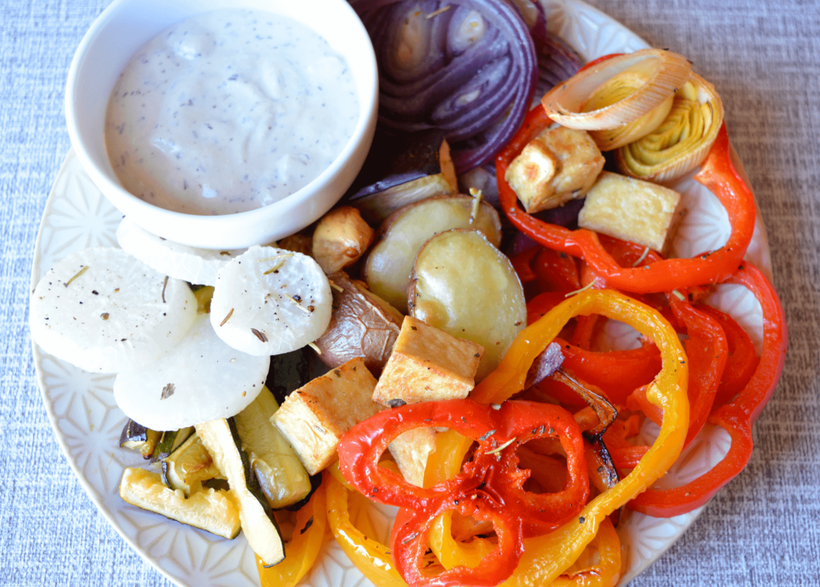 239 cal tofu and veggie snack from a tray bake. Mediterranean seasonings and tzatziki dip.