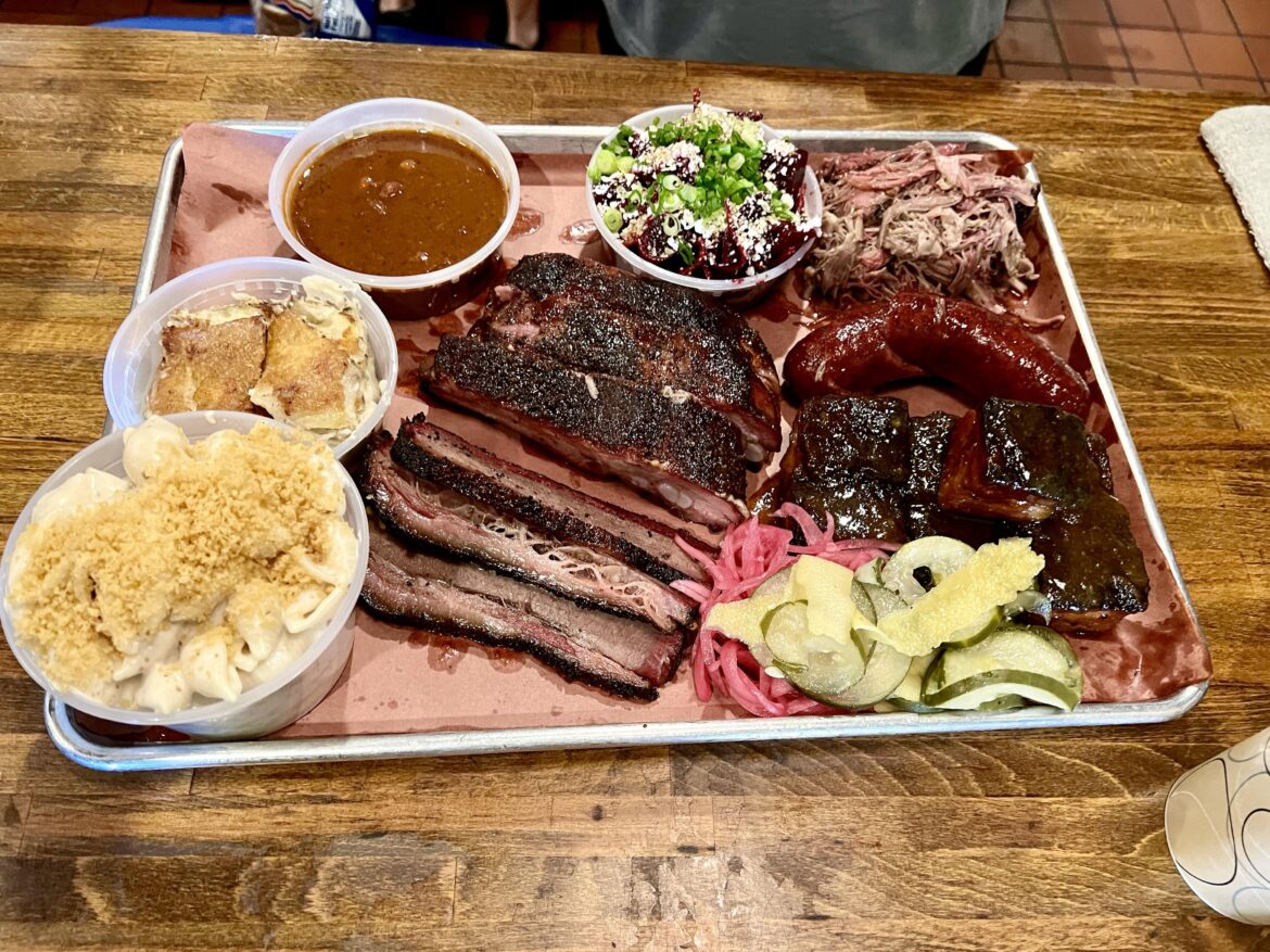 I had Interstellar BBQ, rated #1 bbq in Austin and #2 in Texas. On this platter, there’s brisket, pork ribs, peach tea glazed pork belly, pulled lamb shoulder, kielbasa sausage, among other side dishes.