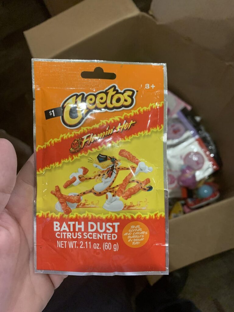 We get boxes of unsold product at the church I volunteer at as donations to the poor, today we got these, Cheetos flavored BathBombs!!