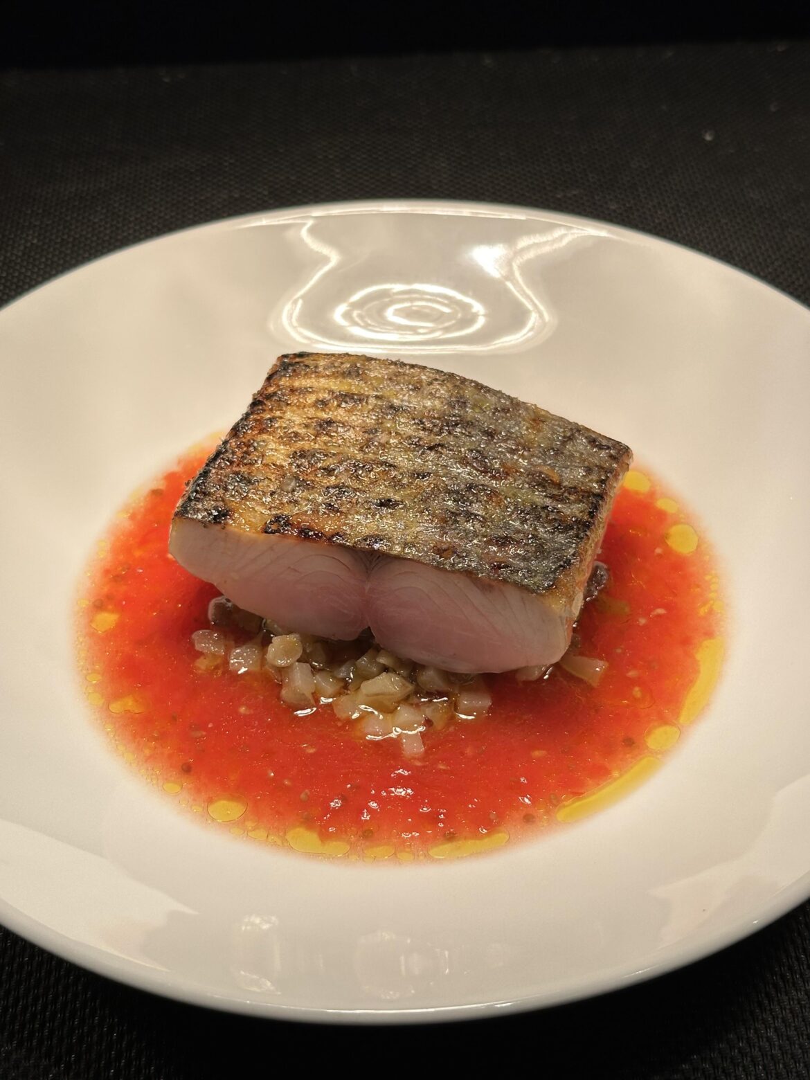 Grilled Spanish Mackerel, Confit Jerusalem Artichoke, Heirloom Tomato dressing.