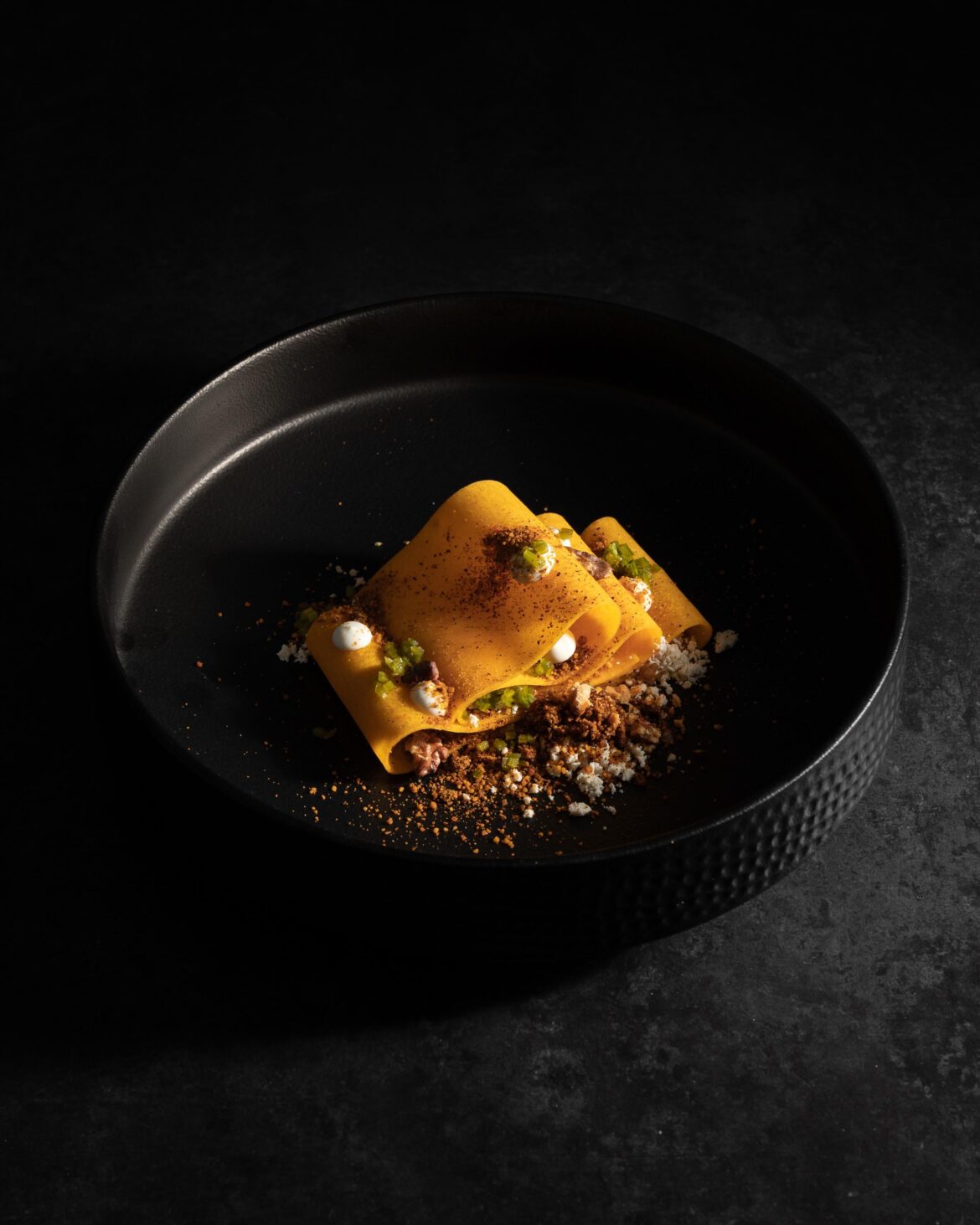 pumpkin sheet | walnut idli podi (walnut gunpowder seasoning) | walnut oil cream | charcoal 'feta' | fermented cilantro stems