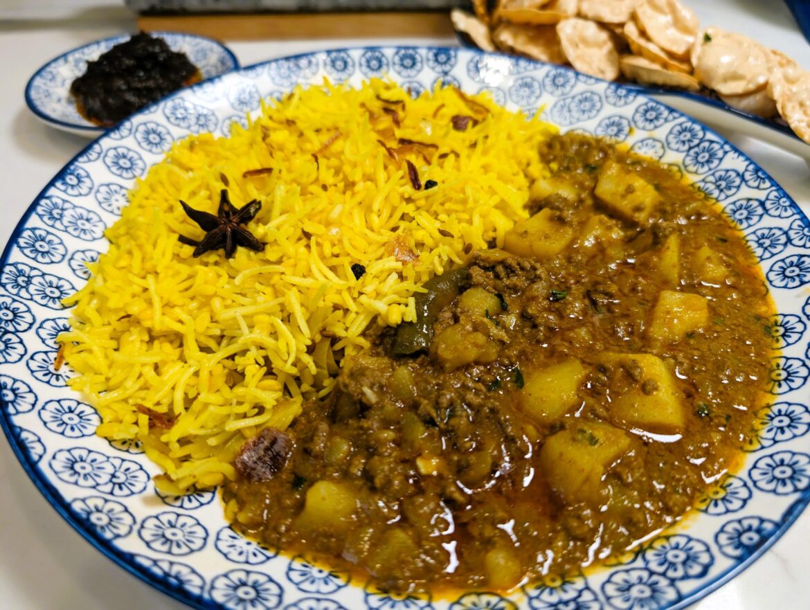 Aloo Keema - Mutton Mince & Potato Curry served with moong dal rice.
