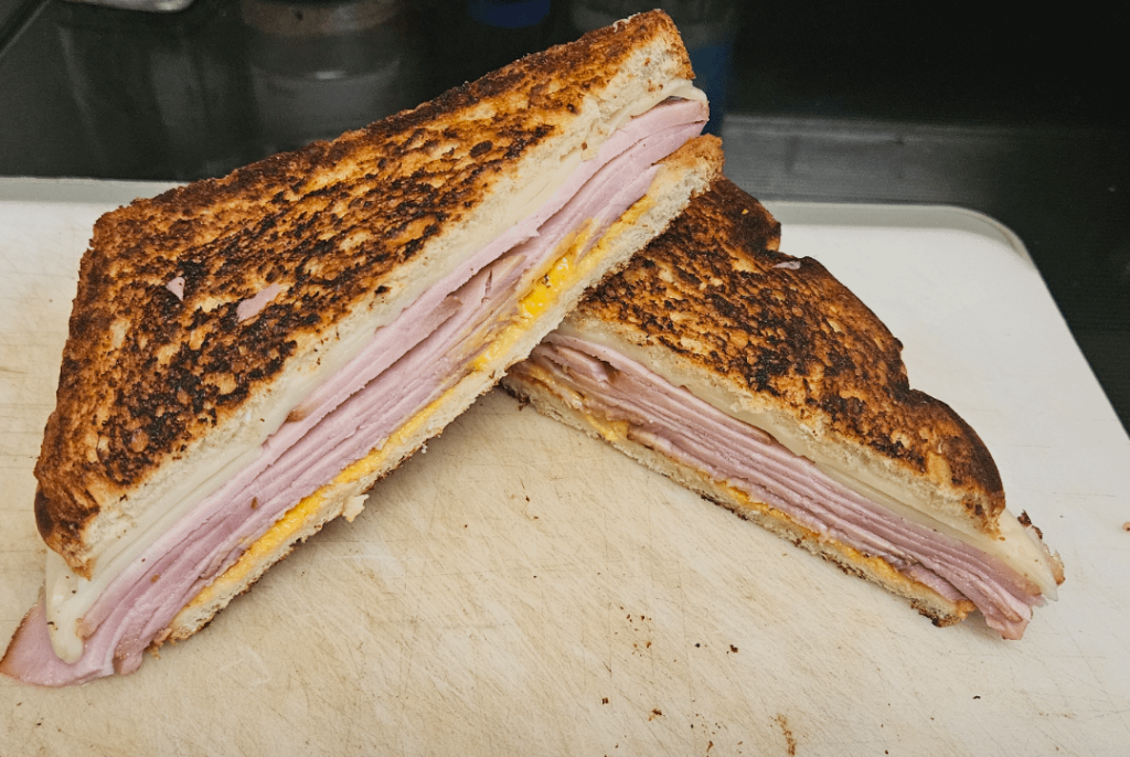 Grilled ham and swiss with a little bit of mustard and spicy mayo.