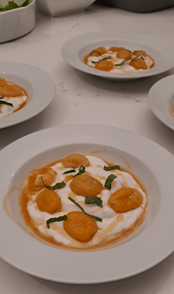 Poached turkish apricots with a coconut yogurt and rooibos syrup.