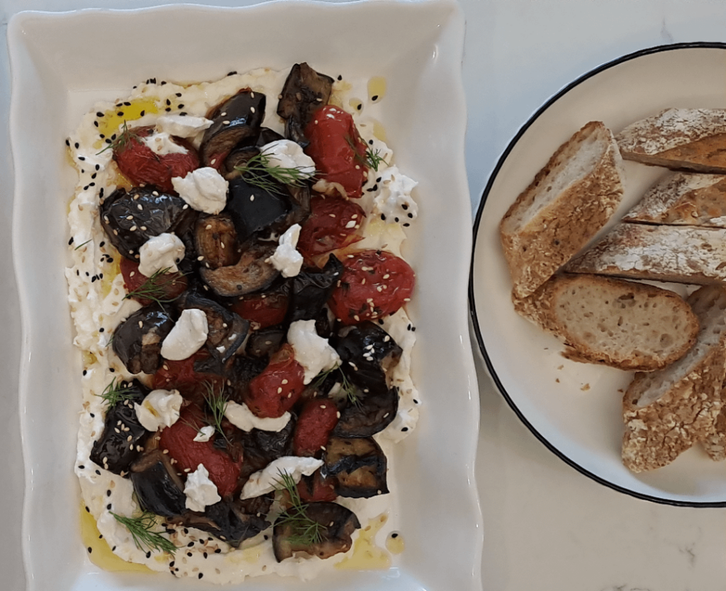 Roast cherry tomatoes,aubergine,labneh and tahini.