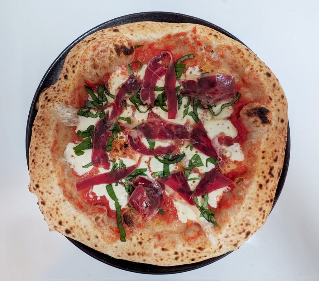 Neapolitan with jamon. 1,000 degrees (indoor pizza oven)