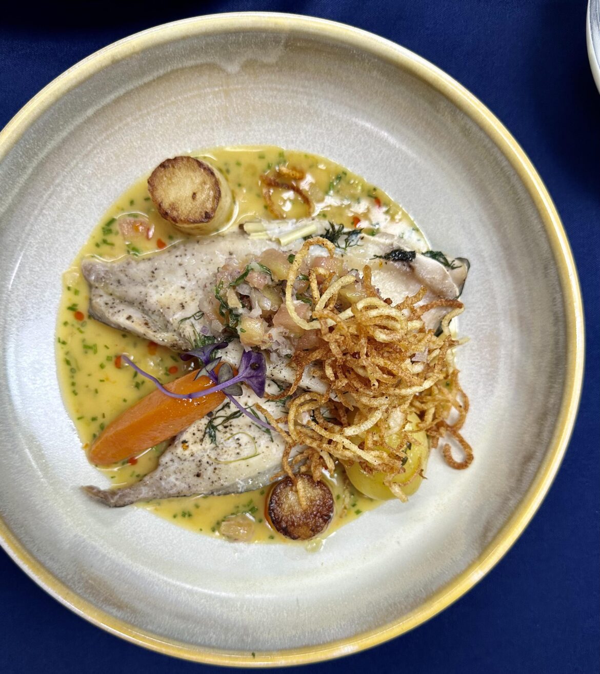 Steamed pompano, orange beurre blanc, tomato salsa, fondant potatoes , glazed carrot