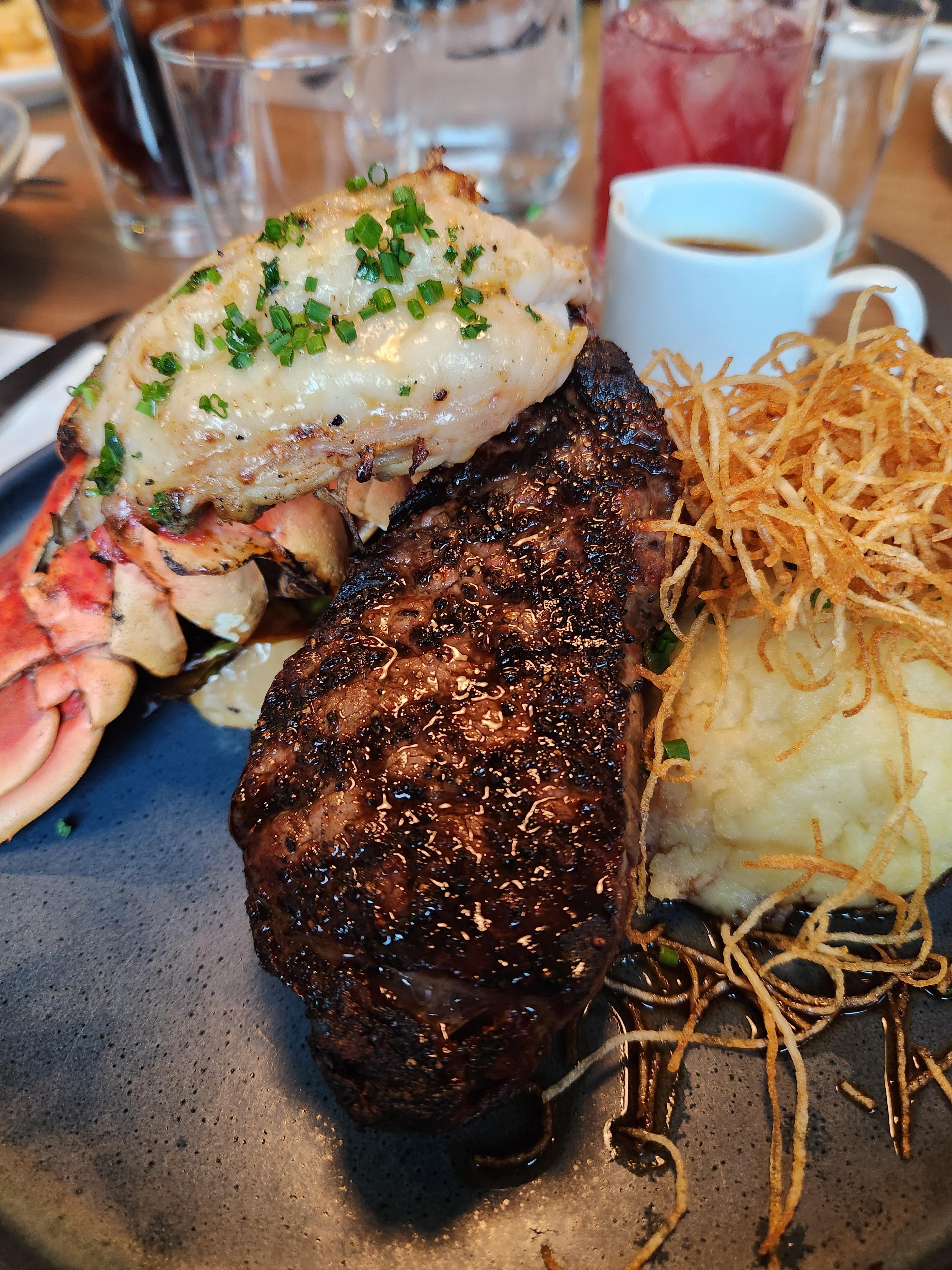 Surf 'n Turf, garlic mash, root veg, peppercorn sauce Dining and Cooking