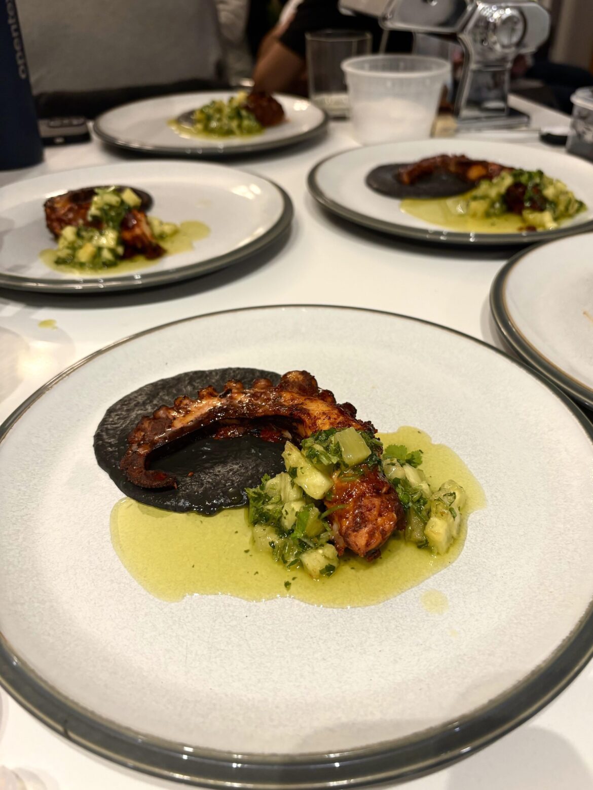 Al Pastor Octopus, black beans, and grilled pineapple chimichurri