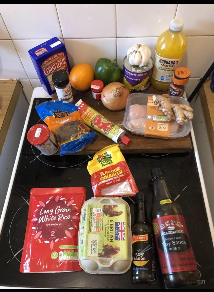 Homemade sweet and sour chicken and egg fried rice