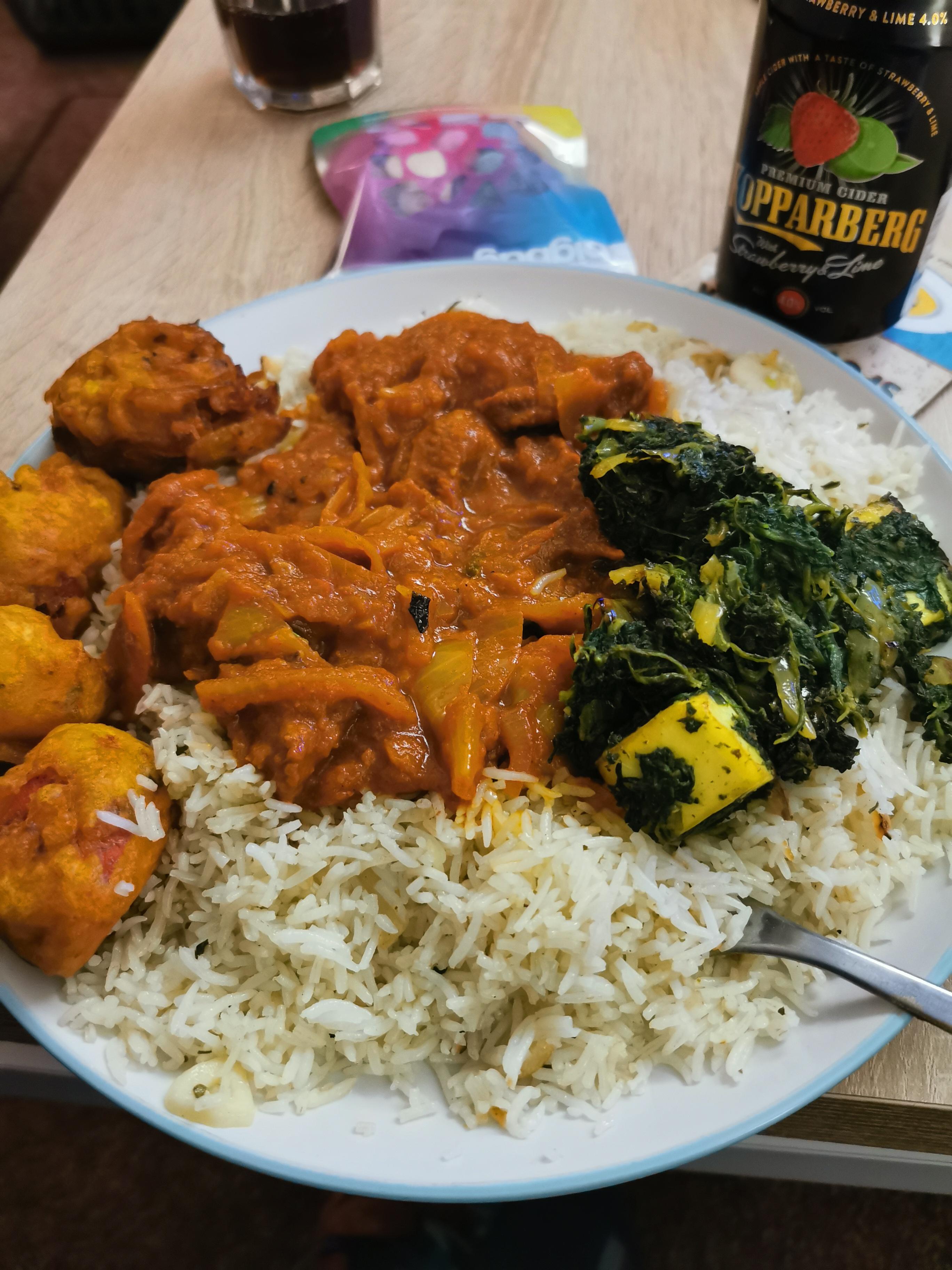 Lamb Bhuna, chicken pakora, bhaji, saag paneer and garlic rice Dining