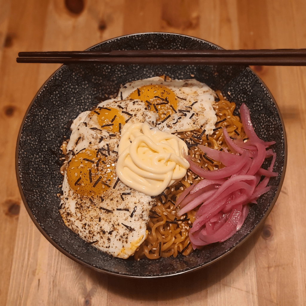 2x Spicy Buldak, Runny Eggs, Kewpie, Homemade Pickled Red Onion. Bone Apple Tea.