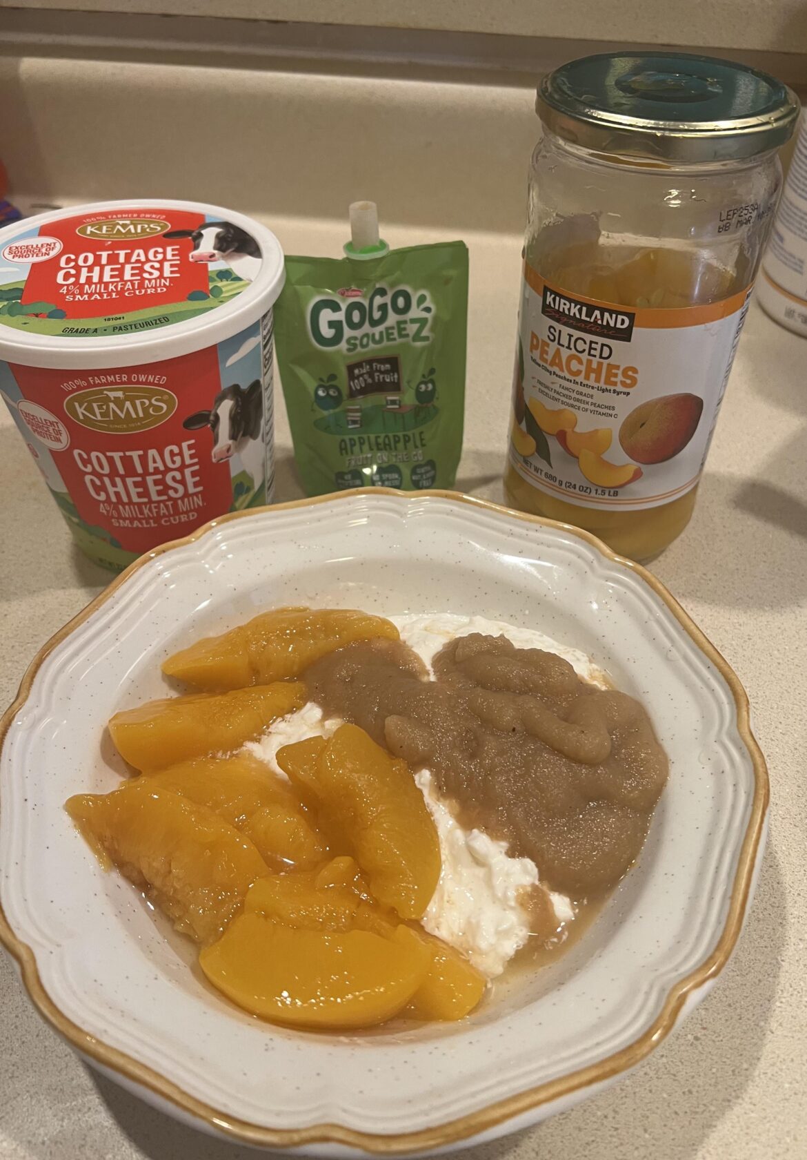 Cottage cheese, applesauce, and peaches