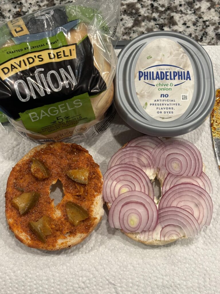 Onion bagel, onion and onion cream cheese with mango pickle.
