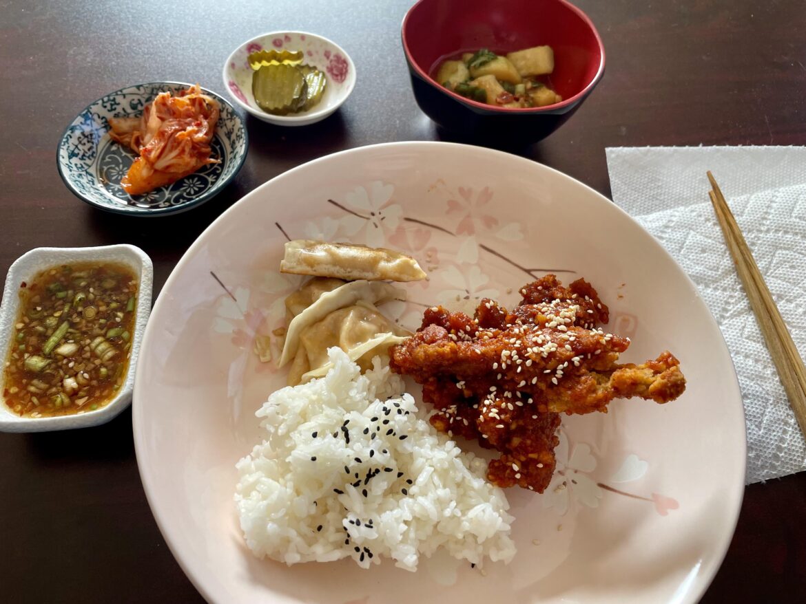 Vegetarian Korean fried chicken, kimchi dumplings and sides.