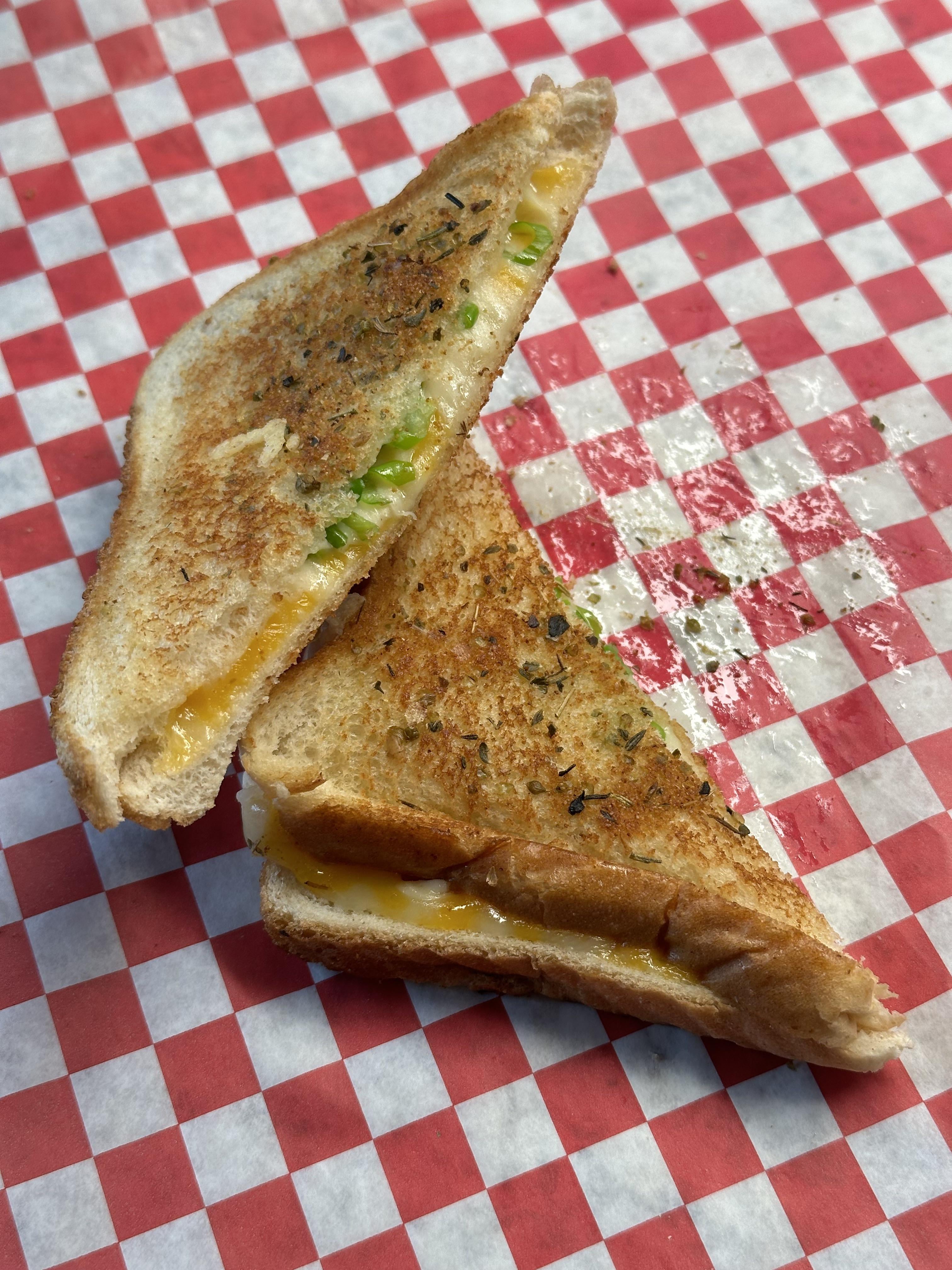 Seasoned Grilled cheese with Colby/montery jack, Mexican melting cheese, and green onions