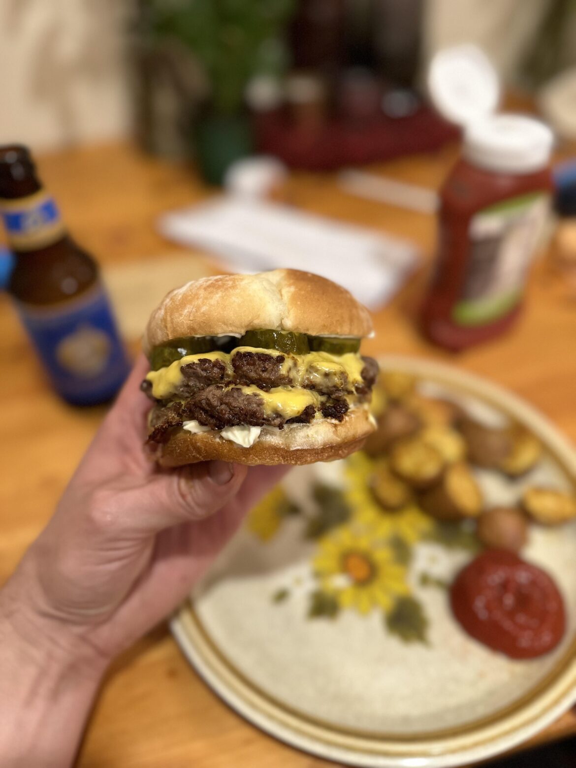 Ground fillet mignon scraps that didn’t make the cut for steaks, American cheese, b&b pickles, curry potatoes