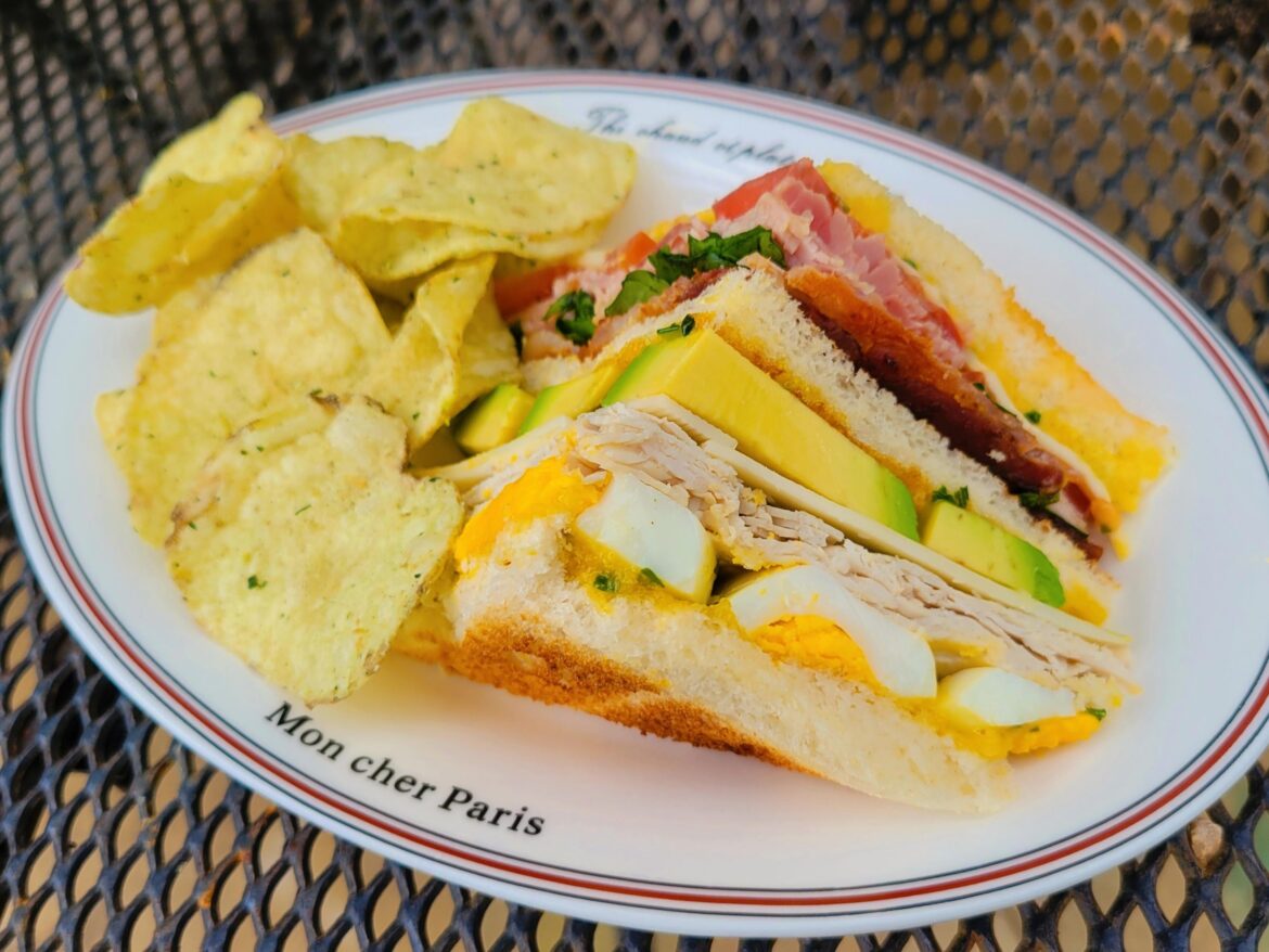 homemade club sandwich in the style of bottega louie