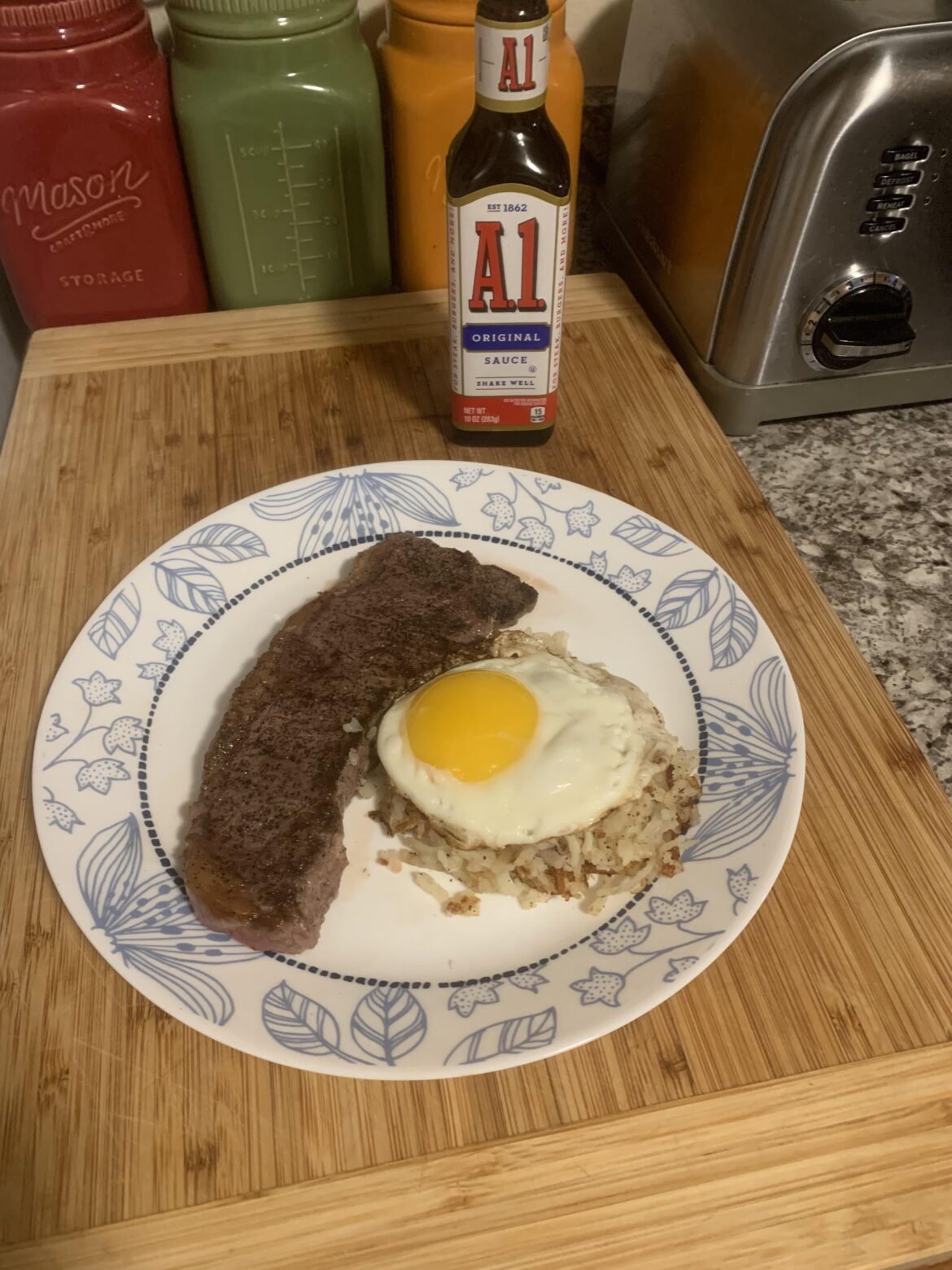 Steak and hash with a egg on top