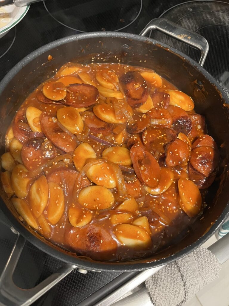 I’m calling it “Tteok-Polski”: rice cake ovalettes with kielbasa and onions.