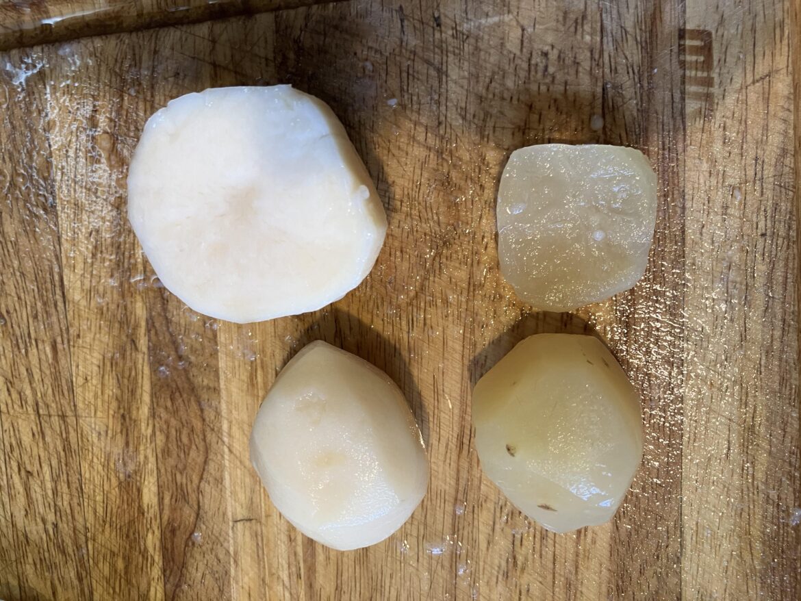 Why are some of my canned potatoes somewhat clear and watery?