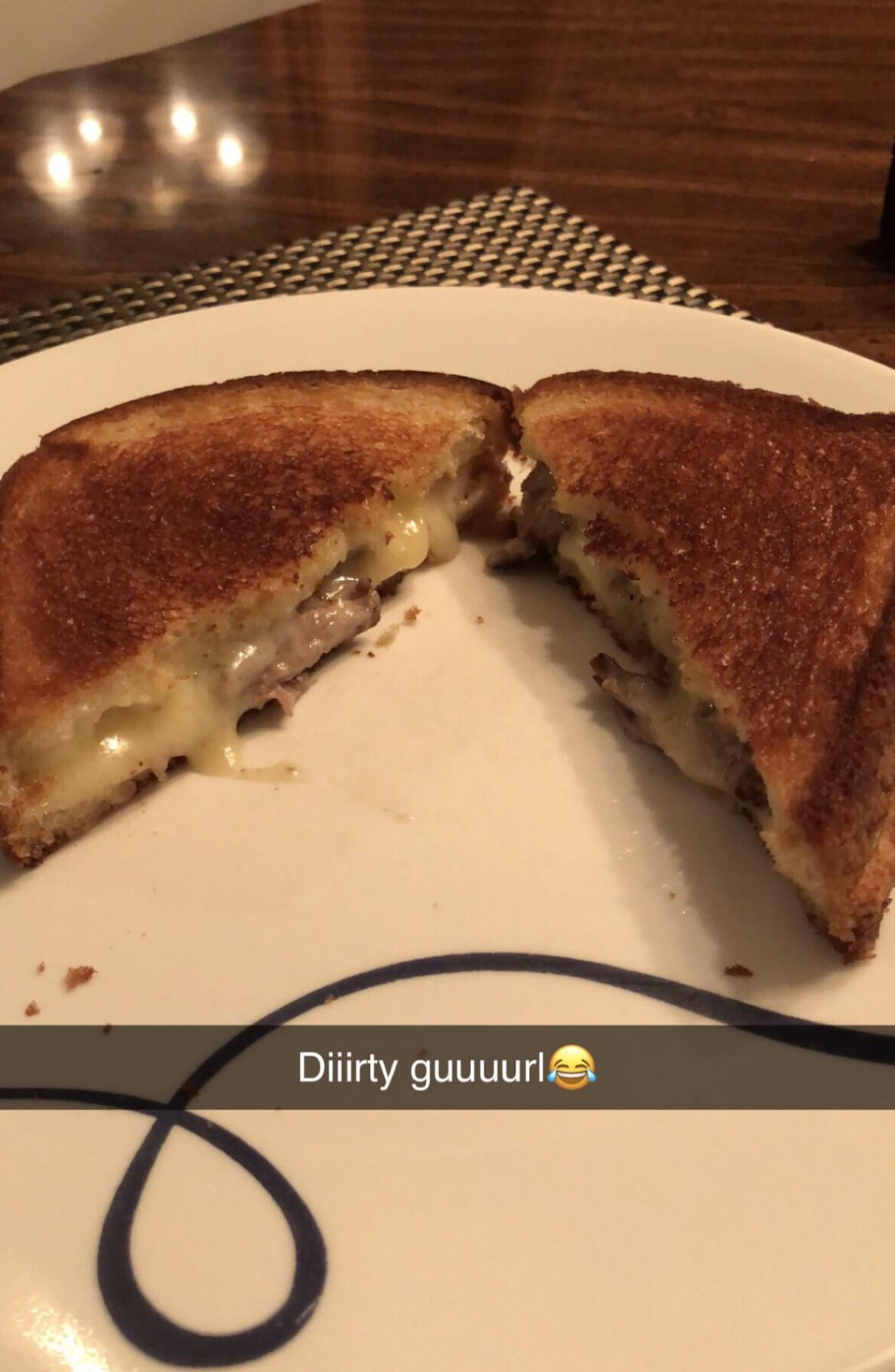 Steak, Gruyère, English white cheddar on Sourdough with a (not shown) bowl of Tomato Basil soup with cracked black pepper. The sweet spot was an un-dipped bite with steak in it fallowed by a dipped bite w/out steak.👌
