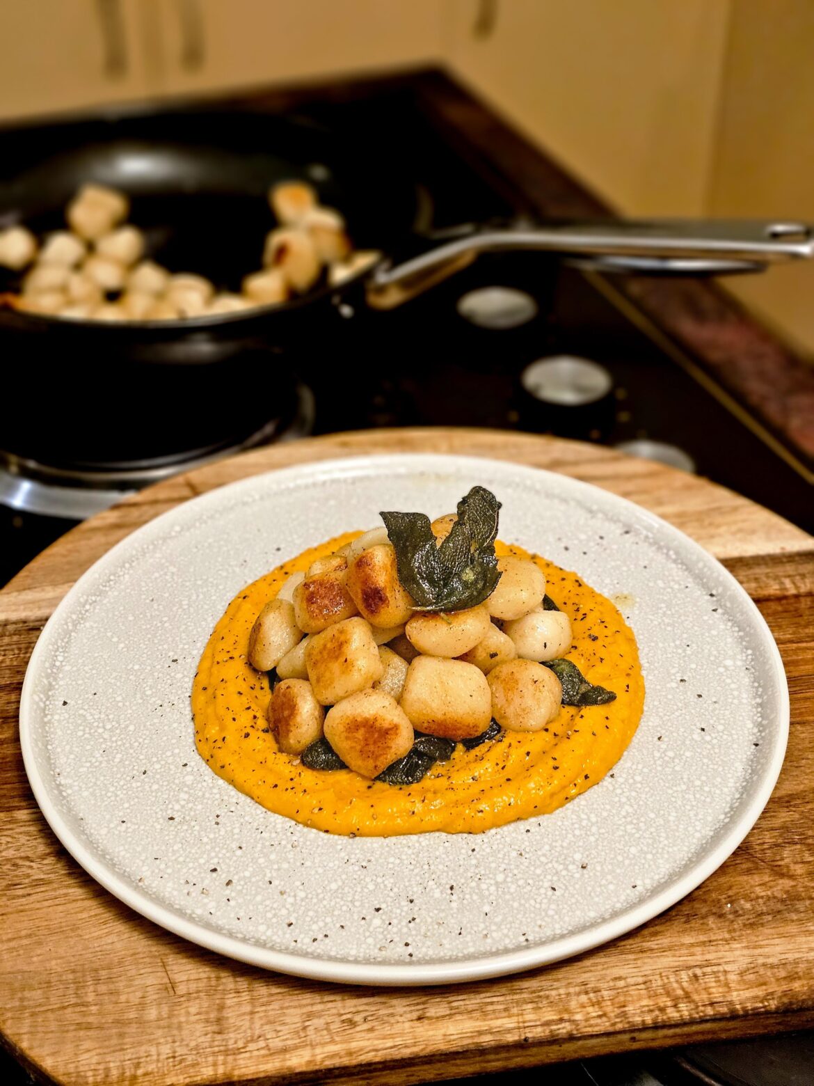 Pan seared gnocchi in brown butter and sage, with roast pumpkin and garlic purée [homemade]