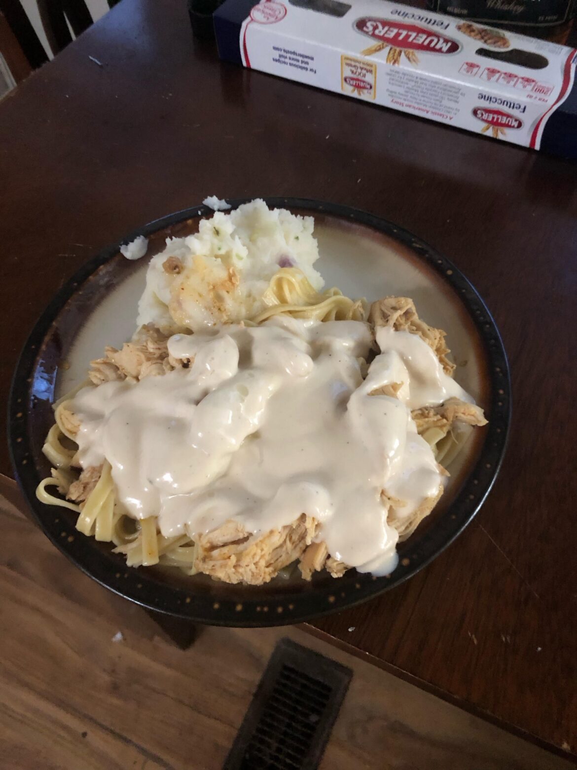 Chicken Alfredo and mashed potatoes,