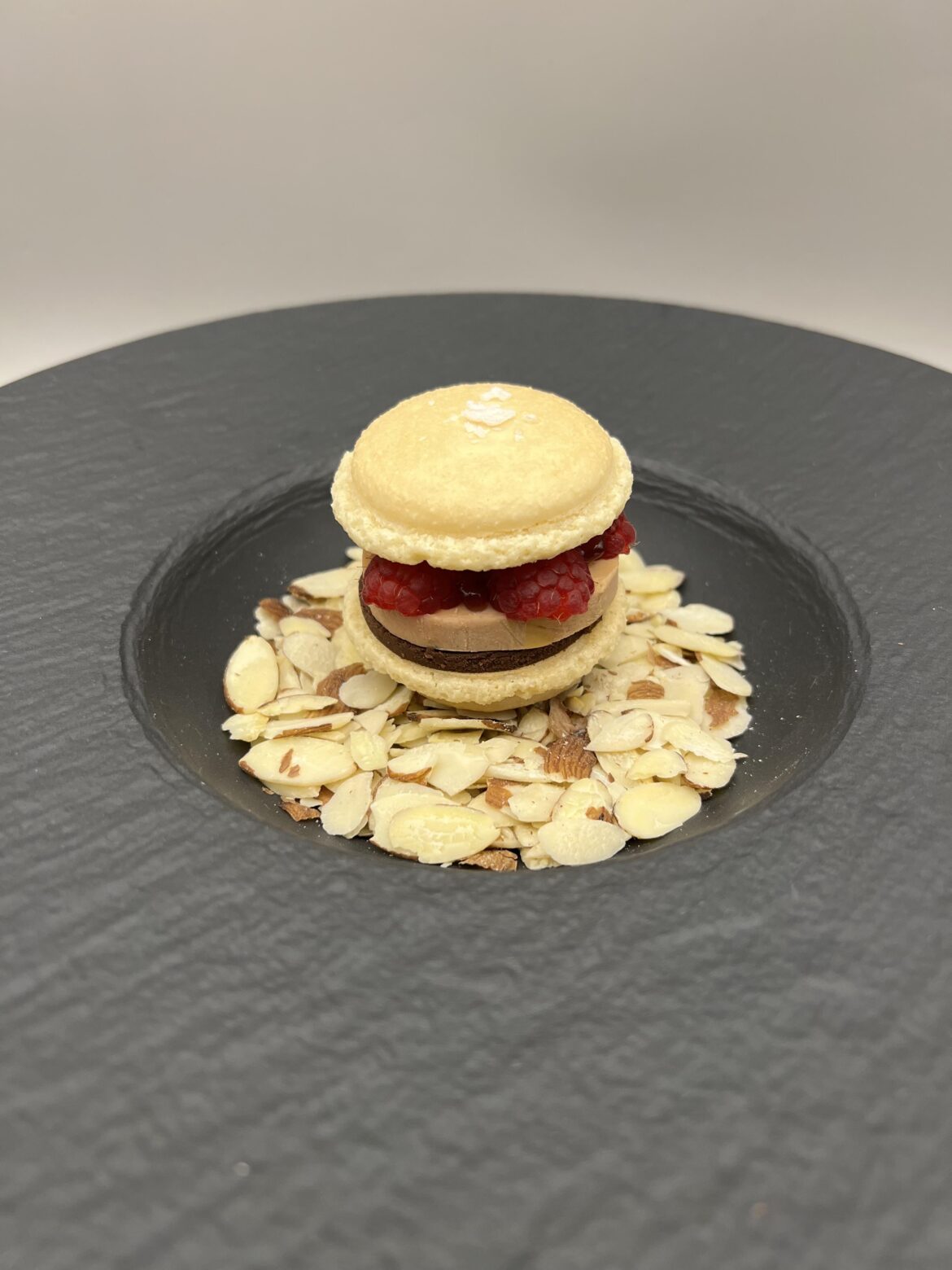 Foie Gras Macaron: Chocolate Ganache, Foie Gras Torchon, Raspberry Lychee Jam, Raspberry