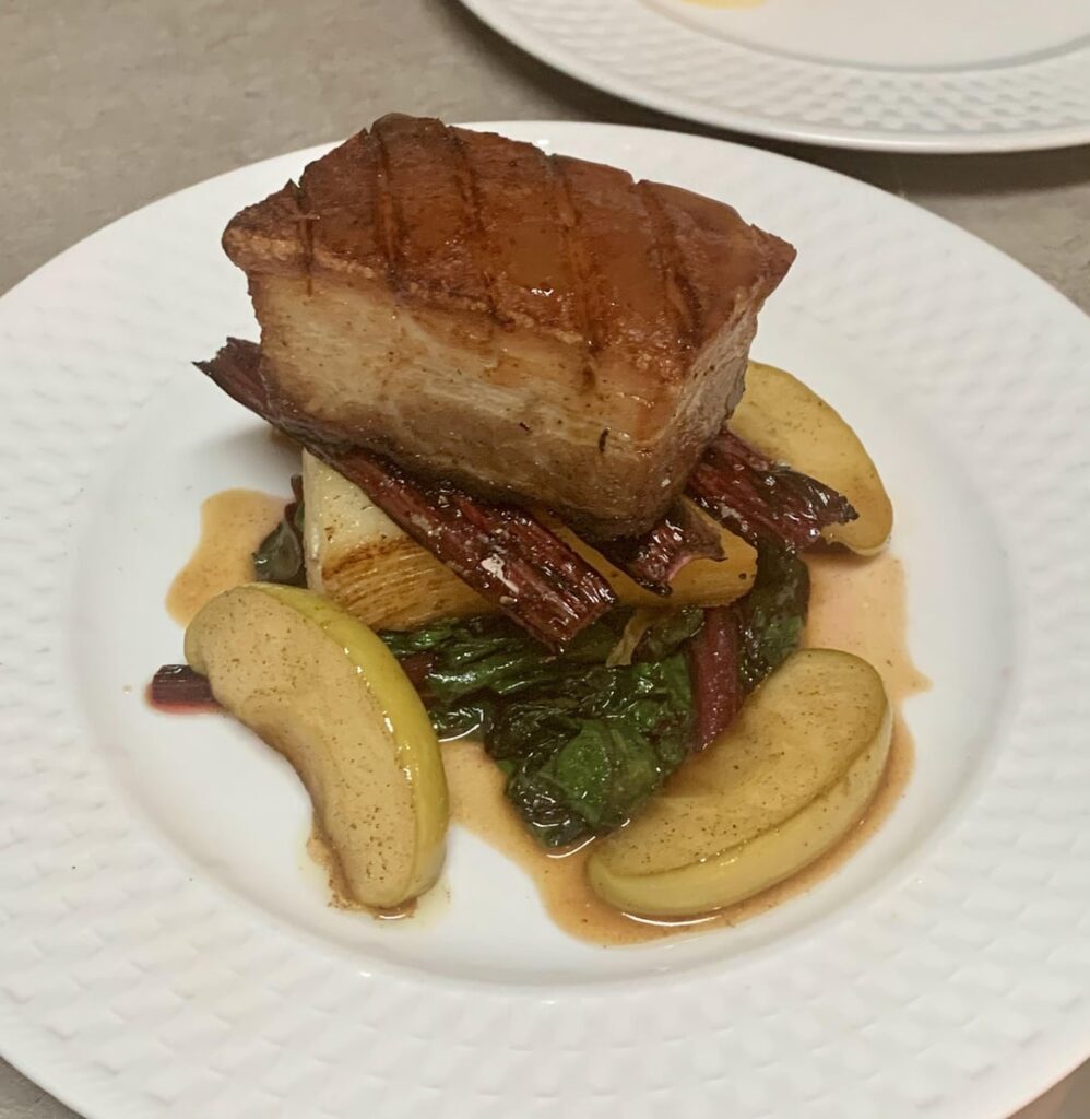 Apple Cider Braised Pork Belly, Potato Pave, Sautéed Swiss Chard, Charred Chard Stems, Apple Cider Glazed Apples, Pork-Apple Jus