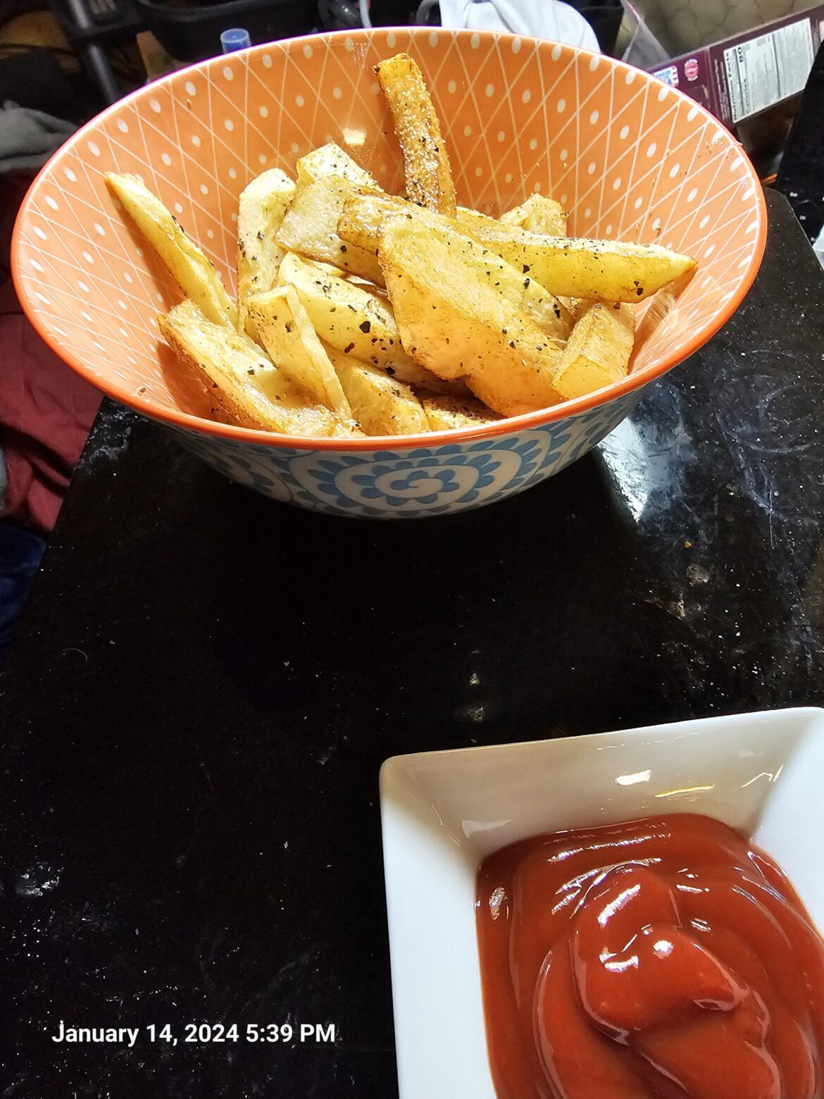 Home fries with dollar store soul food seasoning and spicy ketchup