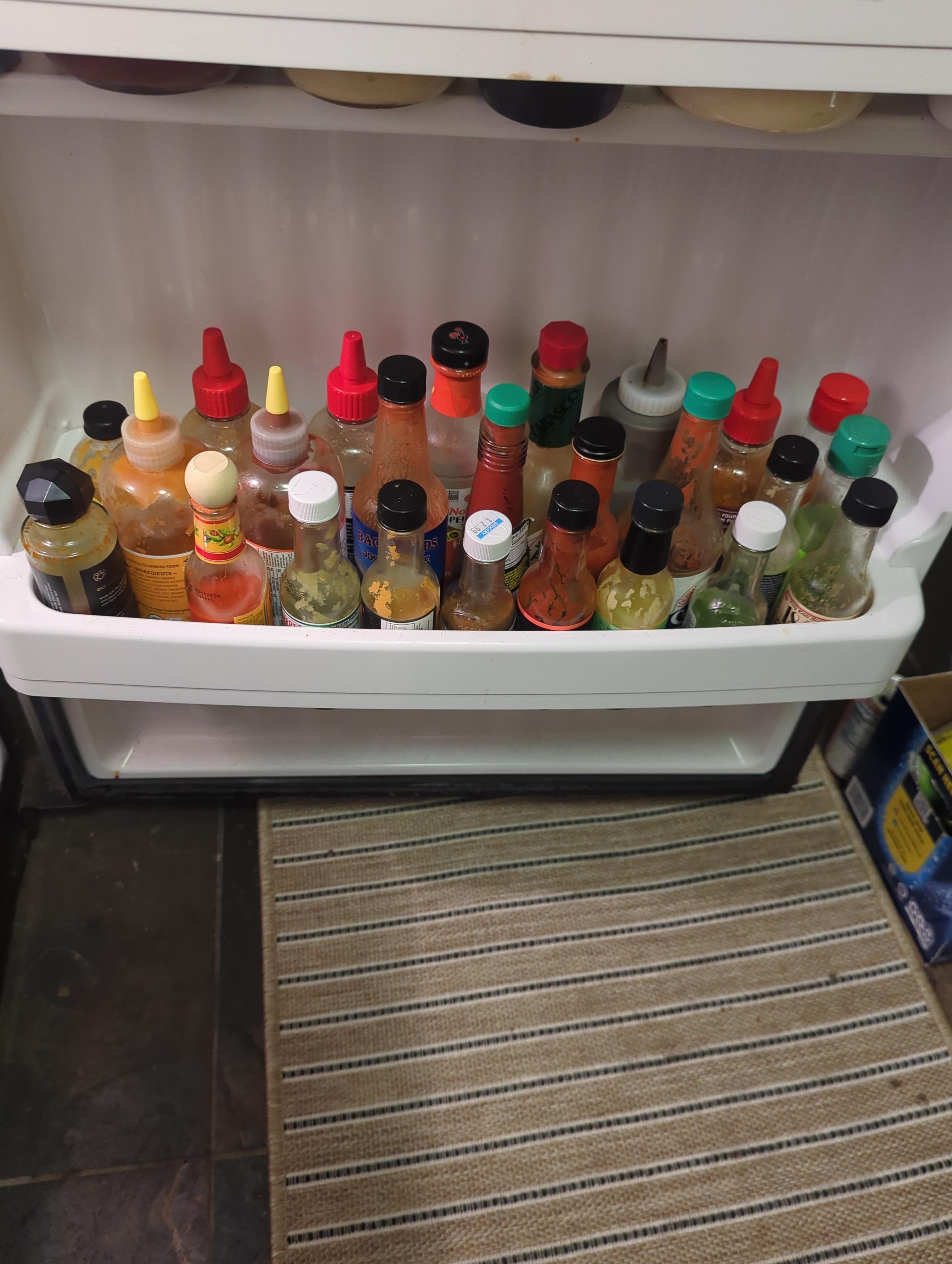 Just joined the sub. What up? This is my dedicated hot sauce shelf in