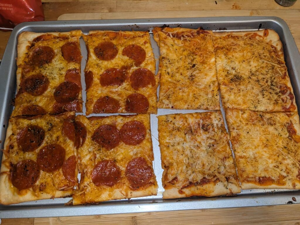 Pillsbury Pizza dough half and half cheese and pepperoni with some Italian seasoning. A lot of vodka while cooking this.