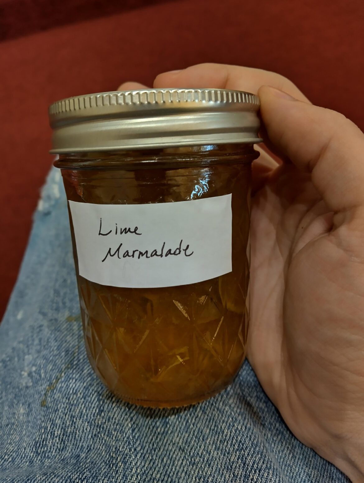 Seal mysteriously popped on my jar, been out at room temperature for 2 months and I don't know when it's popped. Is it still safe?