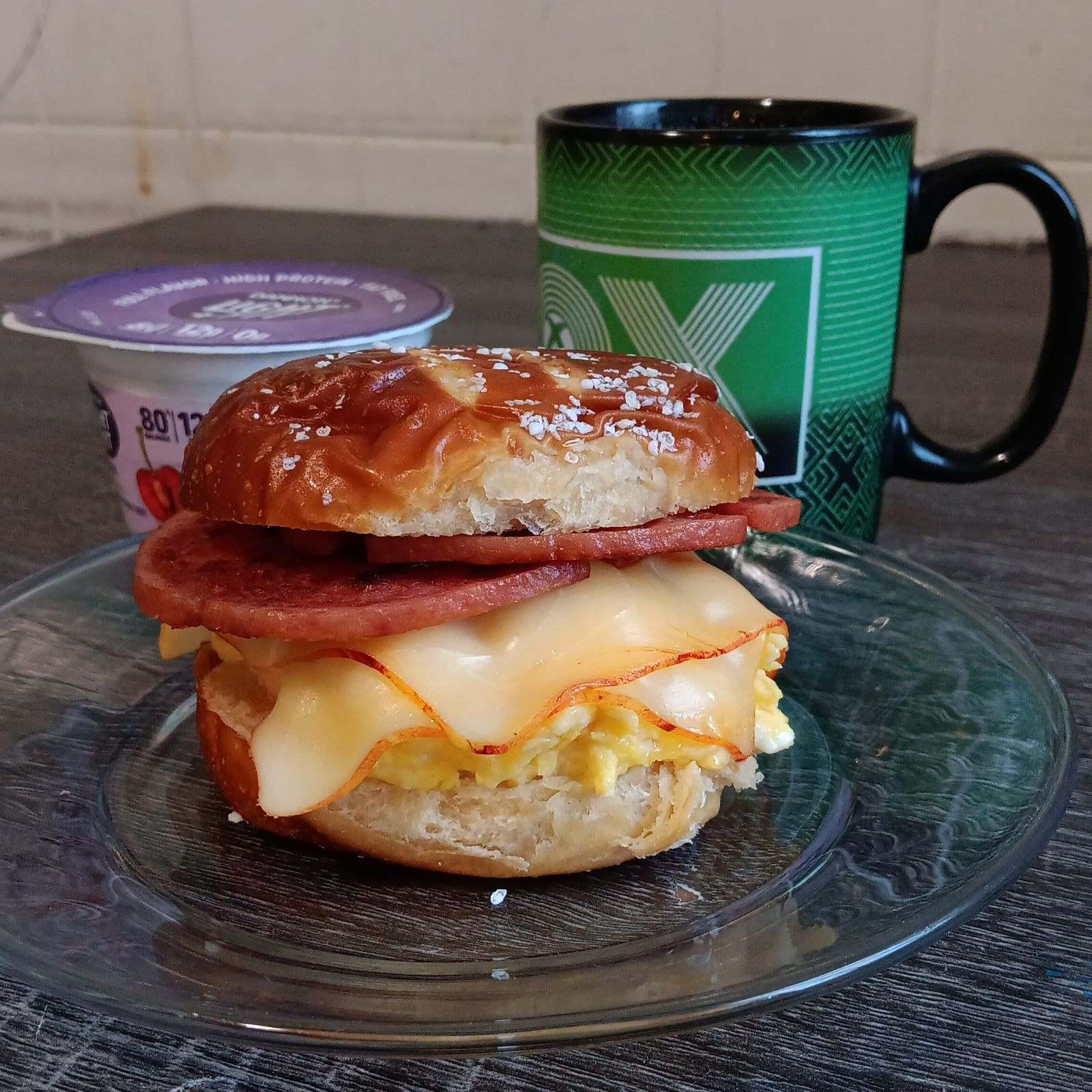 Starting the new year of with a porkroll egg n cheese on a pretzel bun