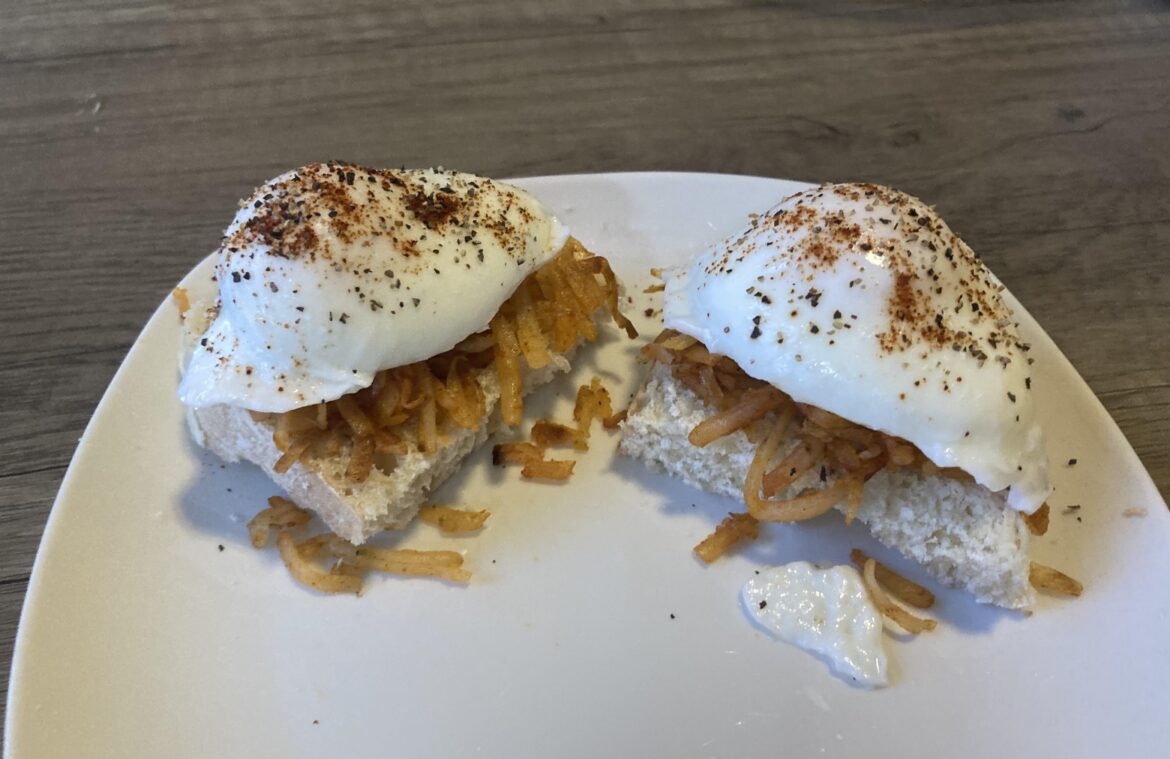 Poached eggs on hashbrowns and toast