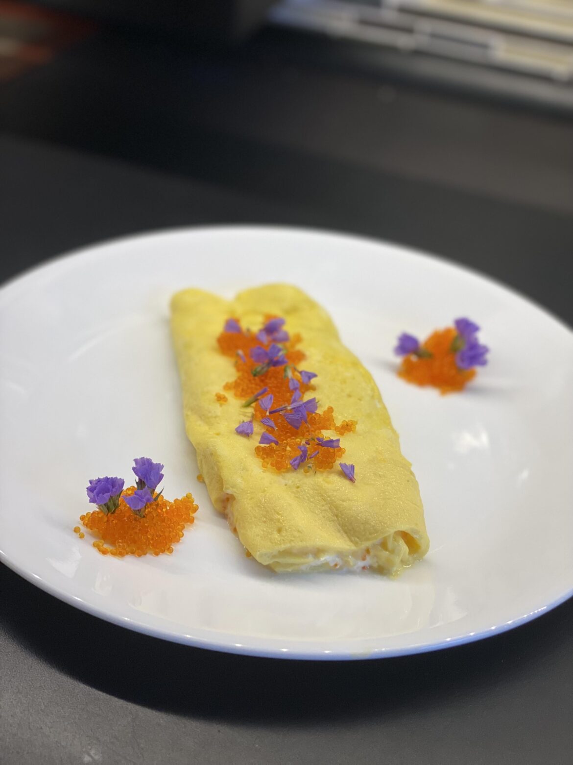 Omelette with Tobiko, Lemon Crème Fraîche, and Parmesan Cheese