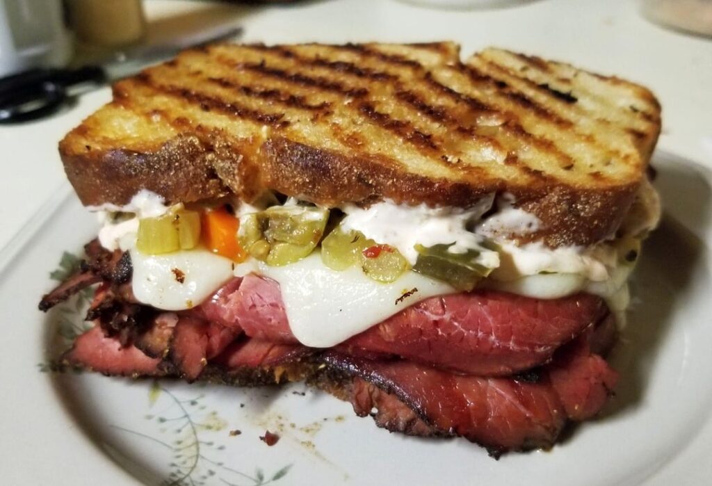 The grilled pastrami giardiniera Reuben with smoked horseradish thousand island dressing. Last minute impromptu switch to home made olive giardiniera since the can of Del Monte Sauerkraut was improperly canned (1.5″ headroom) and really nasty inside. And I’ll do this one again! The grilled pastrami giardiniera Reuben with smoked horseradish thousand island dressing. Last minute impromptu switch to home made olive giardiniera since the can of Del Monte Sauerkraut was improperly canned (1.5" headroom) and really nasty inside. And I'll do this one again!