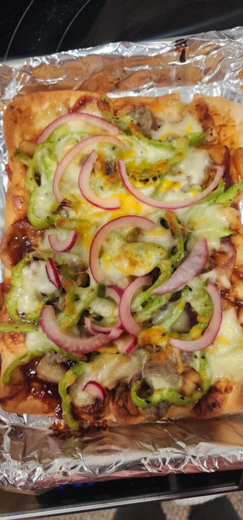 BBQ Pineapple Flatbreads: I added left over cheese and breakfast sausage so it wouldn't go to waste. Very tasty. I'm not a flatbread/pizza person but might order it again if it comes up.