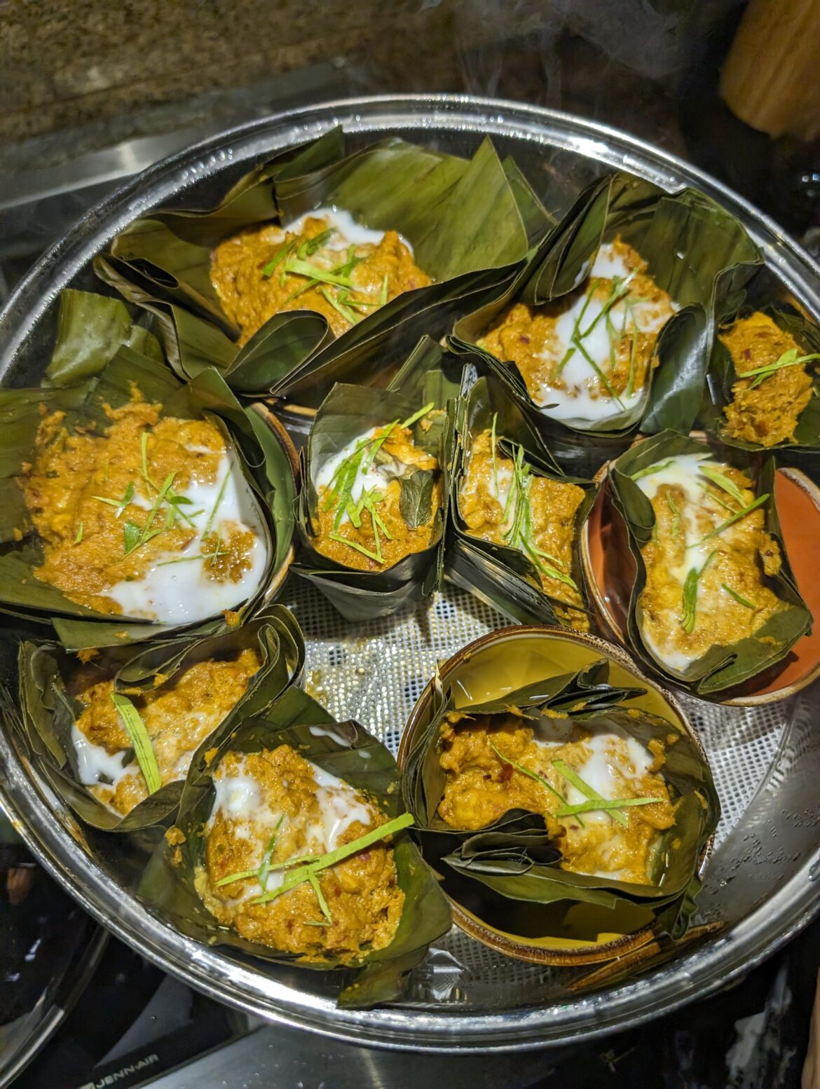 Cambodian fish curry steamed in banana leaves using lemongrass, kaffir, and basil from my garden (amok trei)