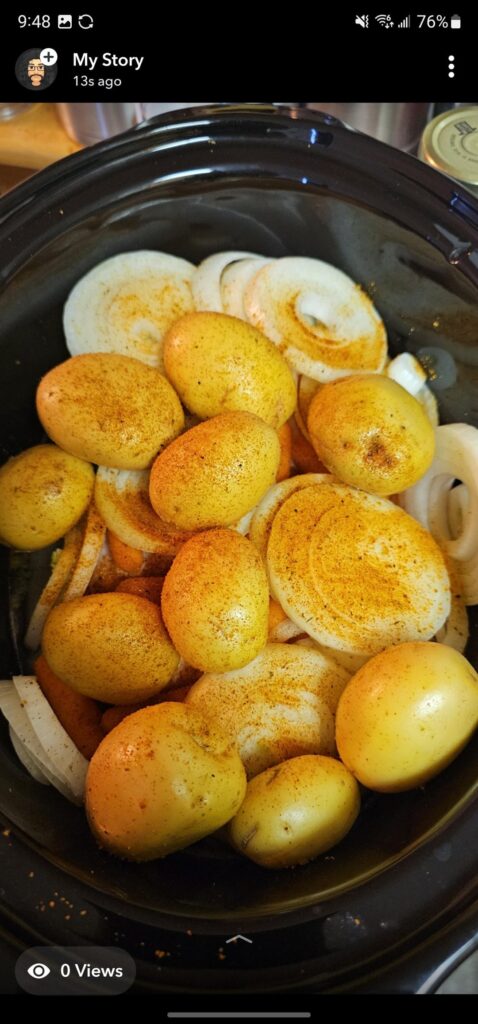 4 pound pork loin with golden potatoes, carrots and onions cooked on low for about 12 hrs with cajun 2 step