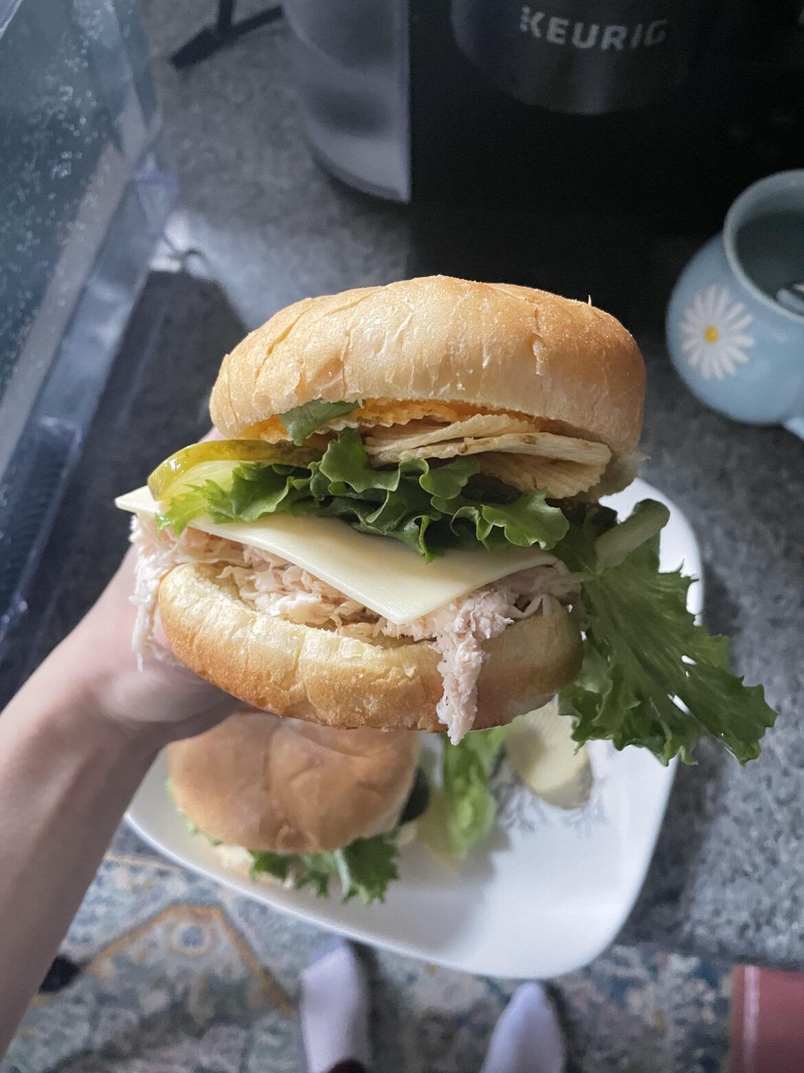 Shaved turkey with lettuce pickles honey mustard and wavy chips on a bulkie roll!