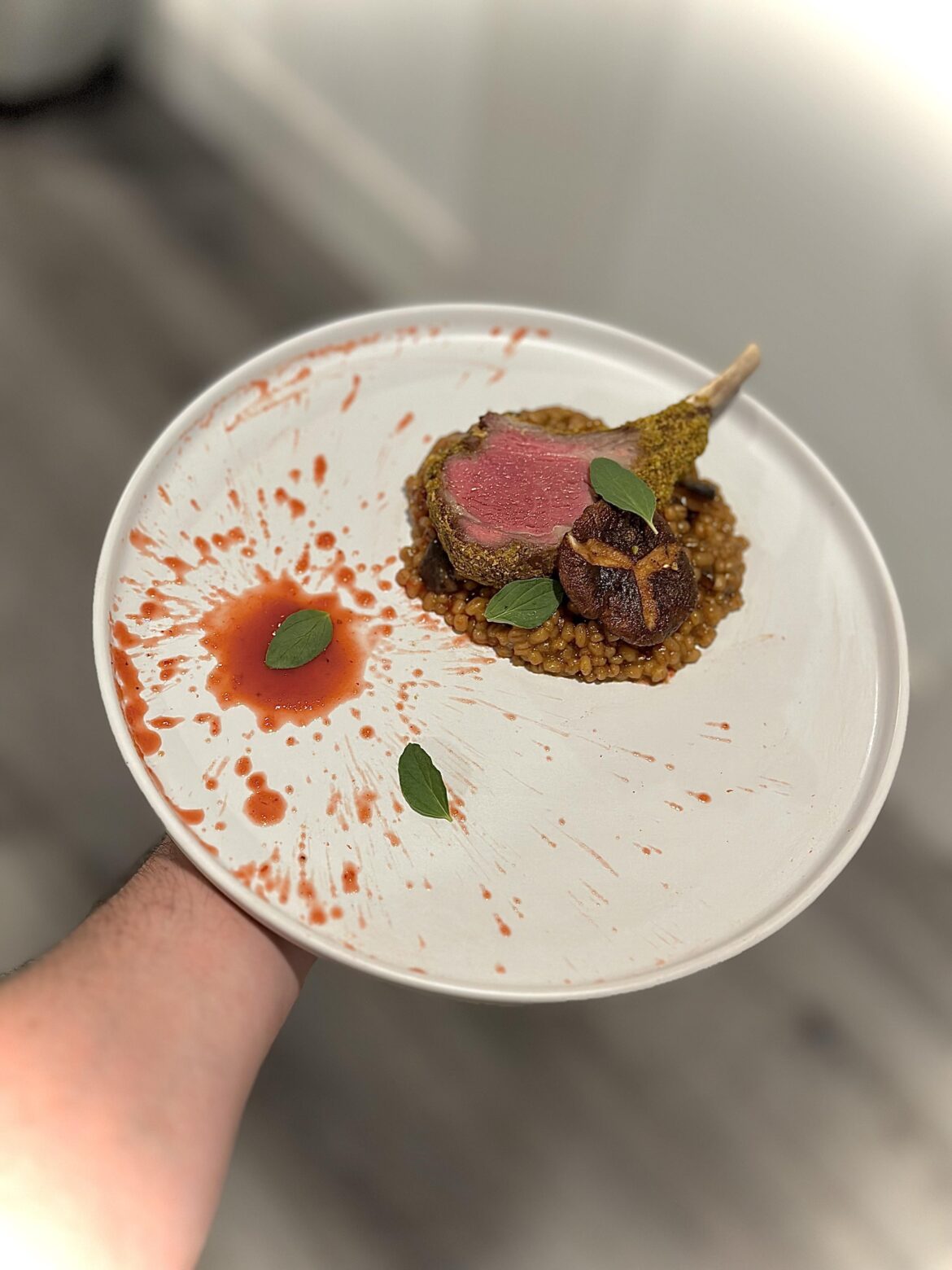 Queen Olive crusted lamb, mushroom barley risotto, rosé plum gelée