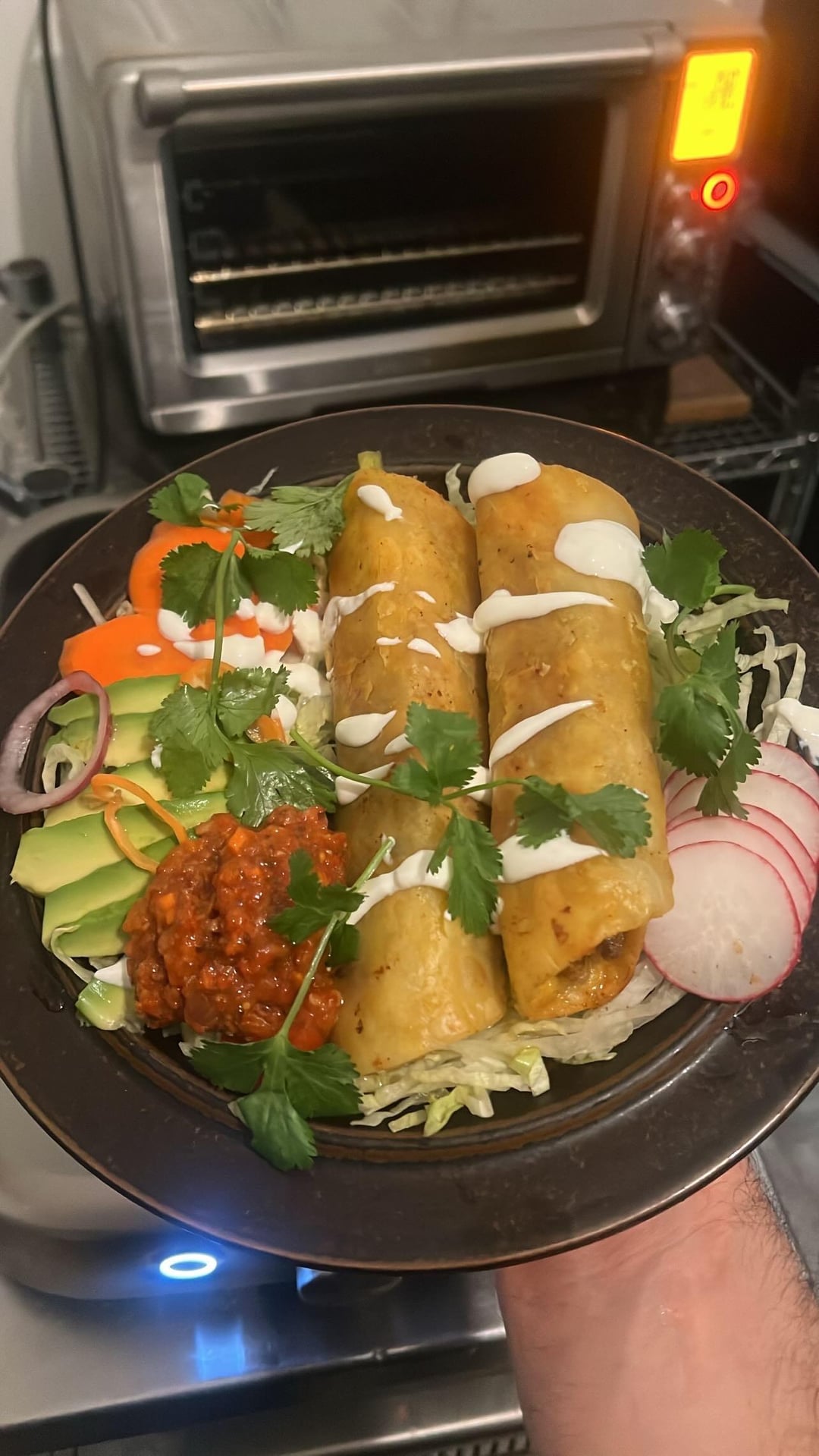 Chorizo, potato, and drunken goat Gouda flautas with lime crema, shiitake, chipotle adobo