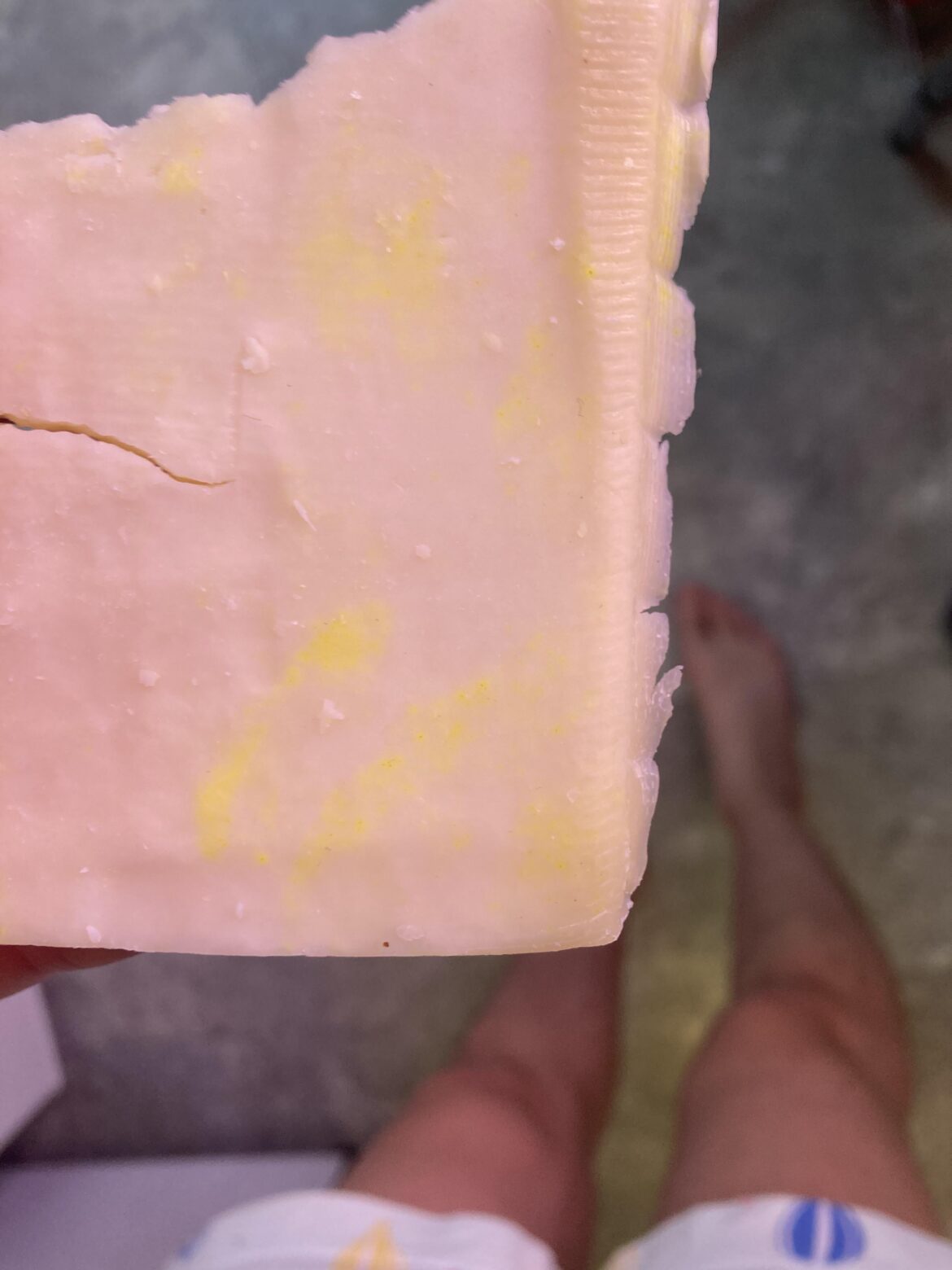 What’s these yellow spots on my Swiss cheese?