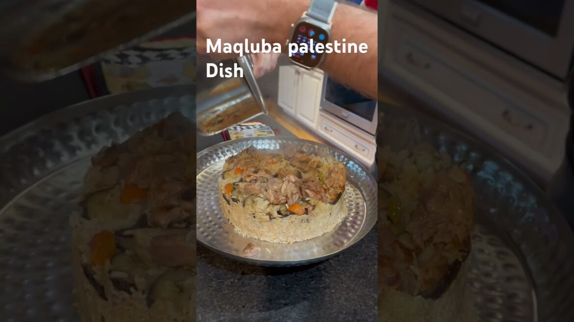 This dish is called Maqluba middle eastern dish made with rice chicken egg plant.